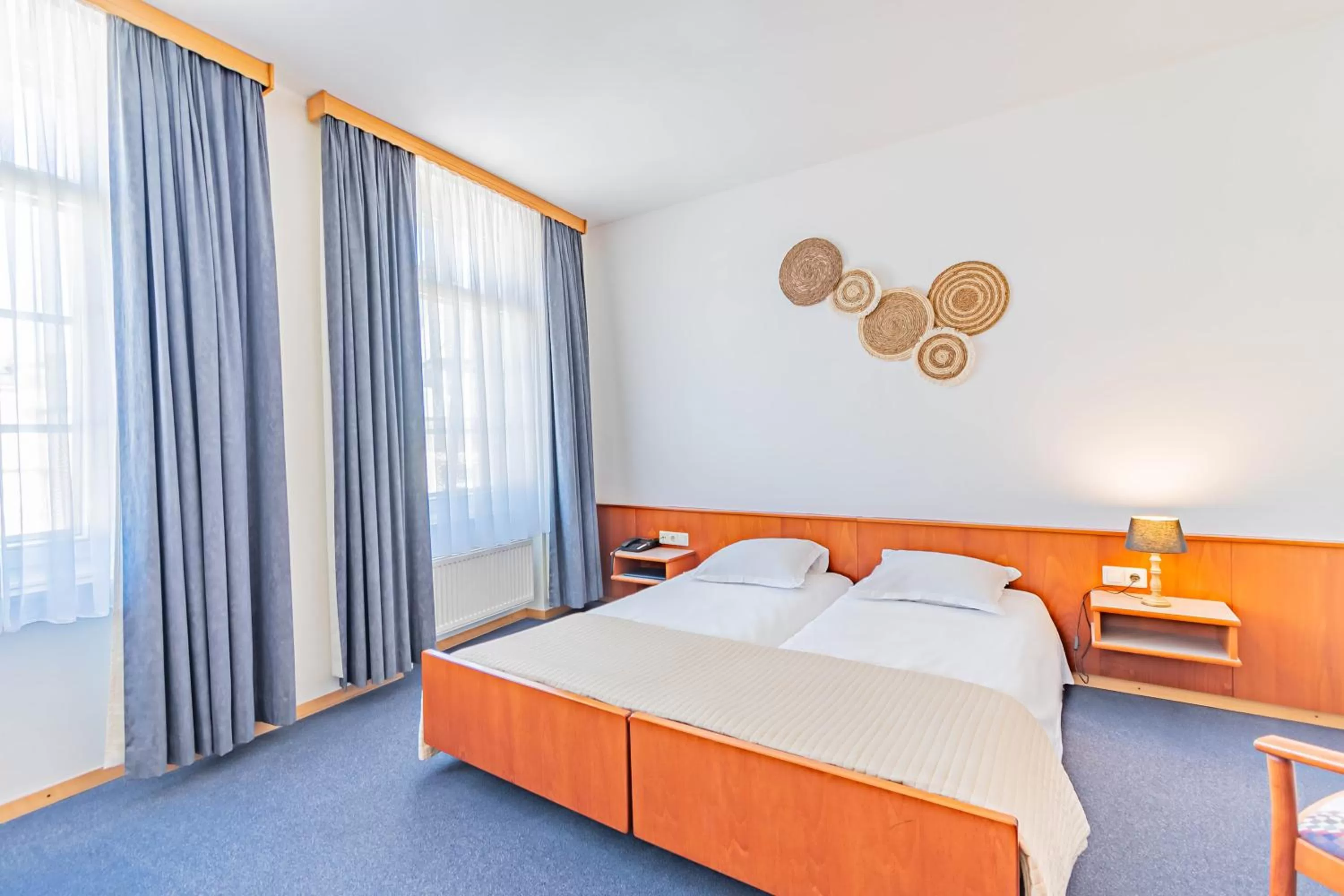 Bed in Hôtel Le Petit Poète