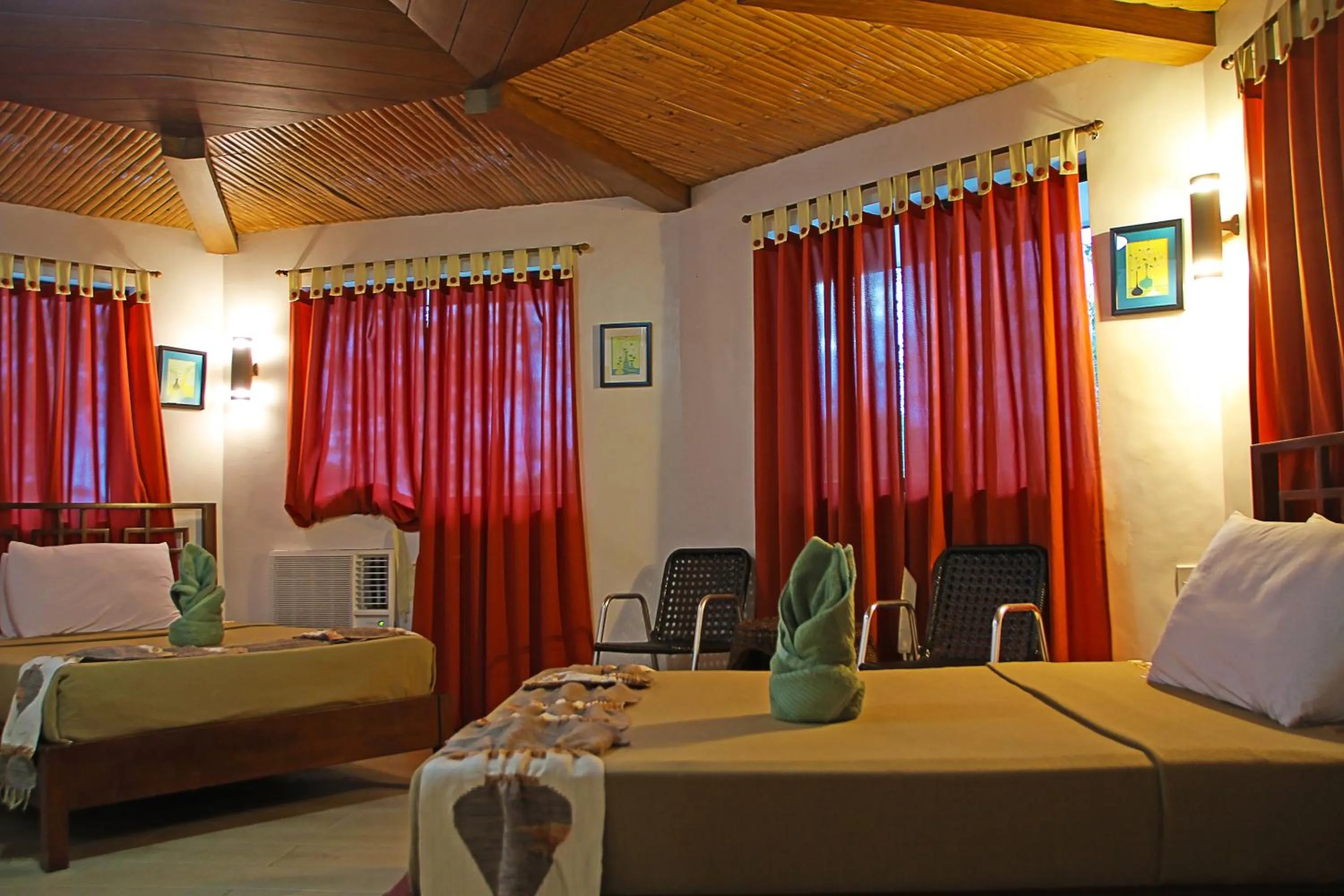 Living room, Bed in Coron Hilltop View Resort