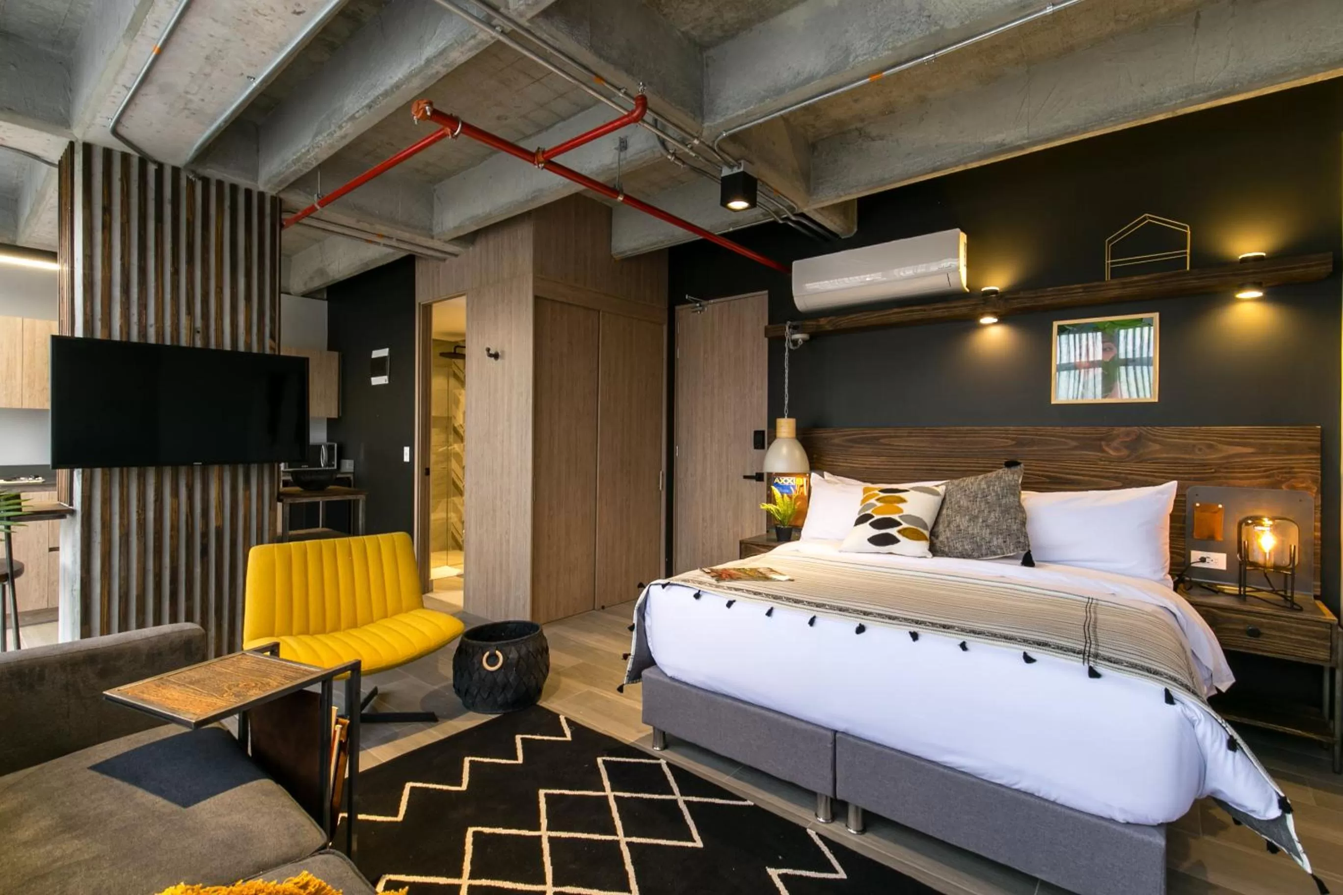 Bed in Factory Lofts Hotel