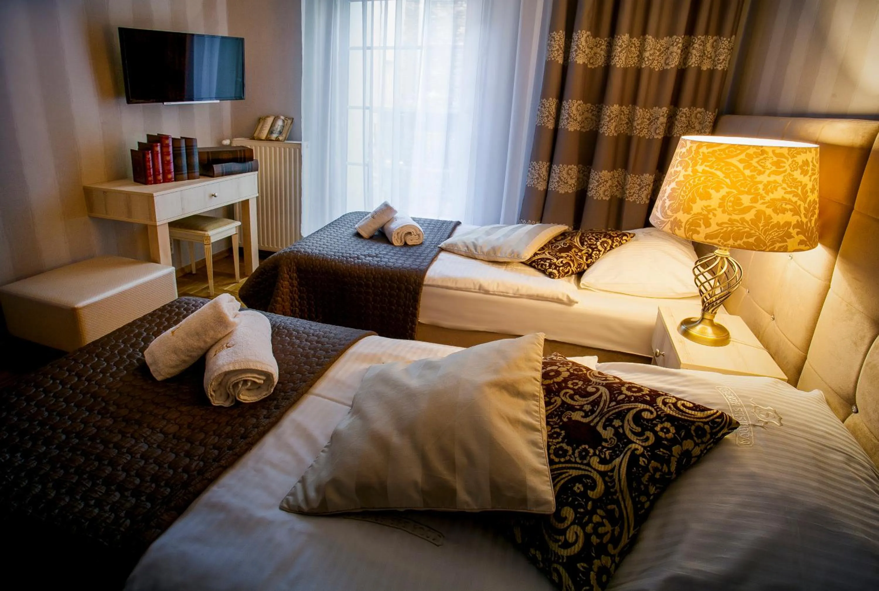 Bed in Aparthotel Oberża