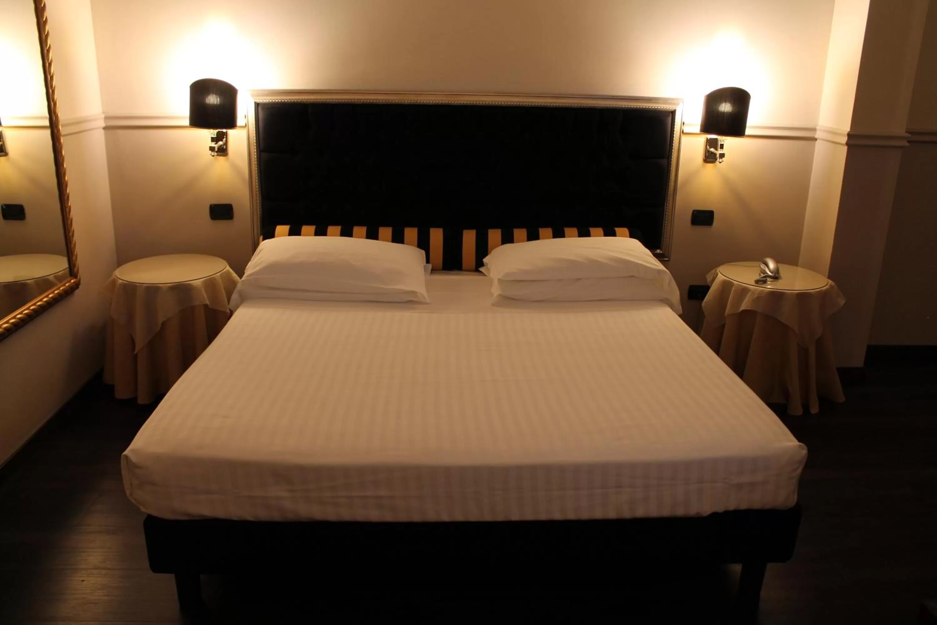 Bed in Hotel Don Carlo