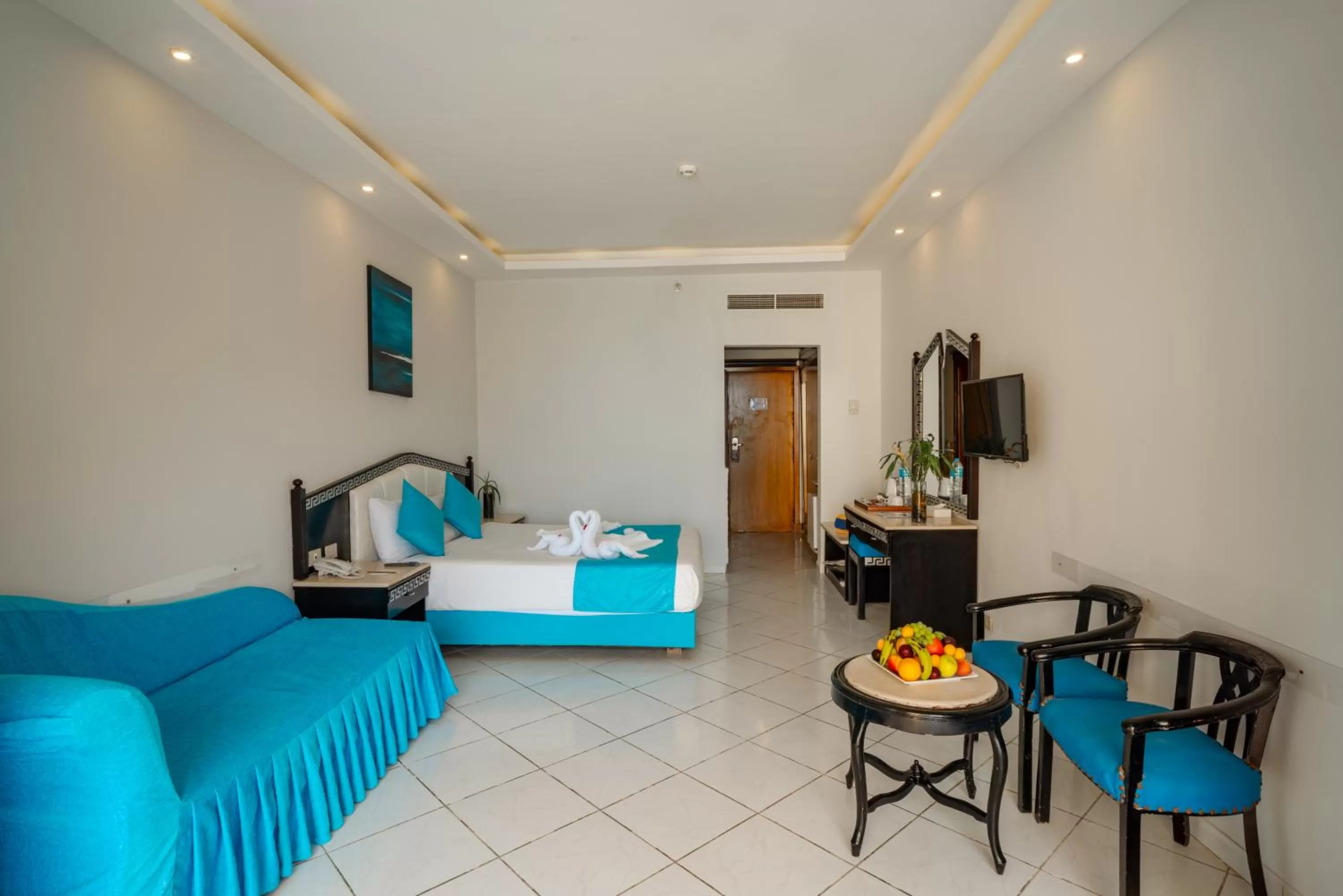 Seating area, Bed in King Tut Aqua Park Beach Resort