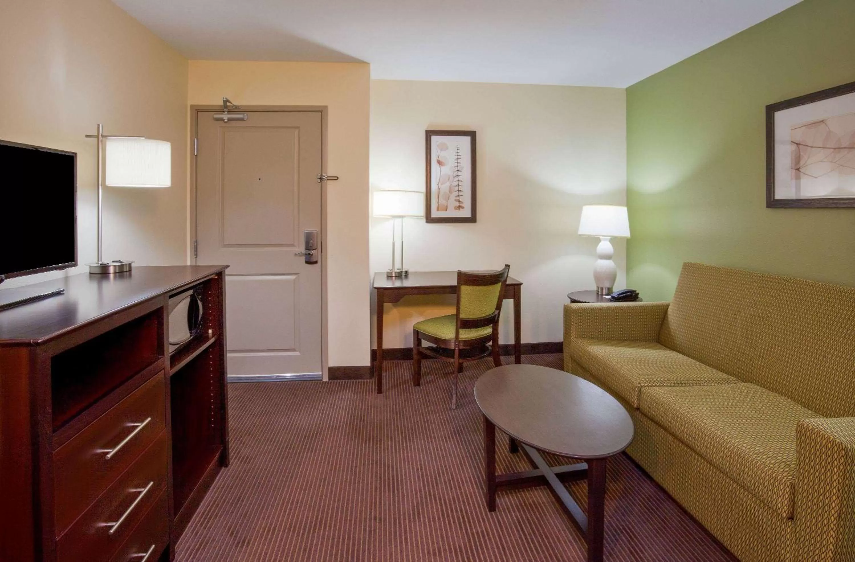Living room in AmericInn by Wyndham Hartford SD