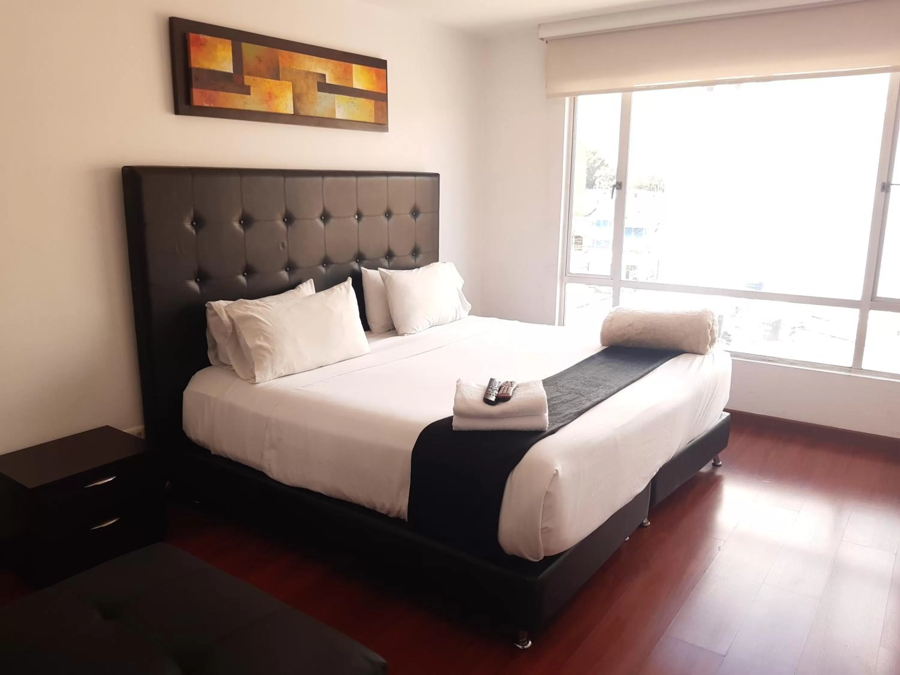Bed in Apartasuites Plaza Modelia