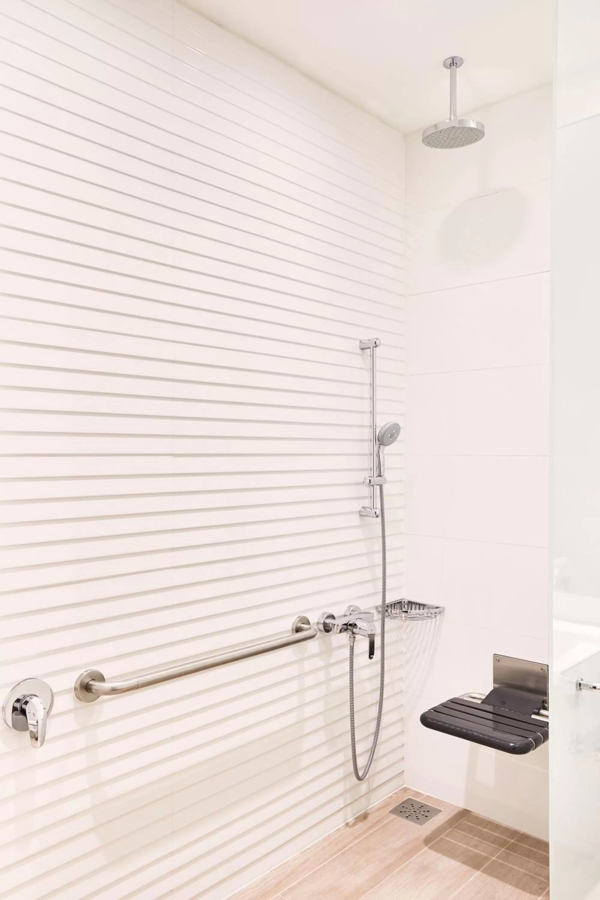 Shower in AC Hotel by Marriott Santiago Cenco Costanera