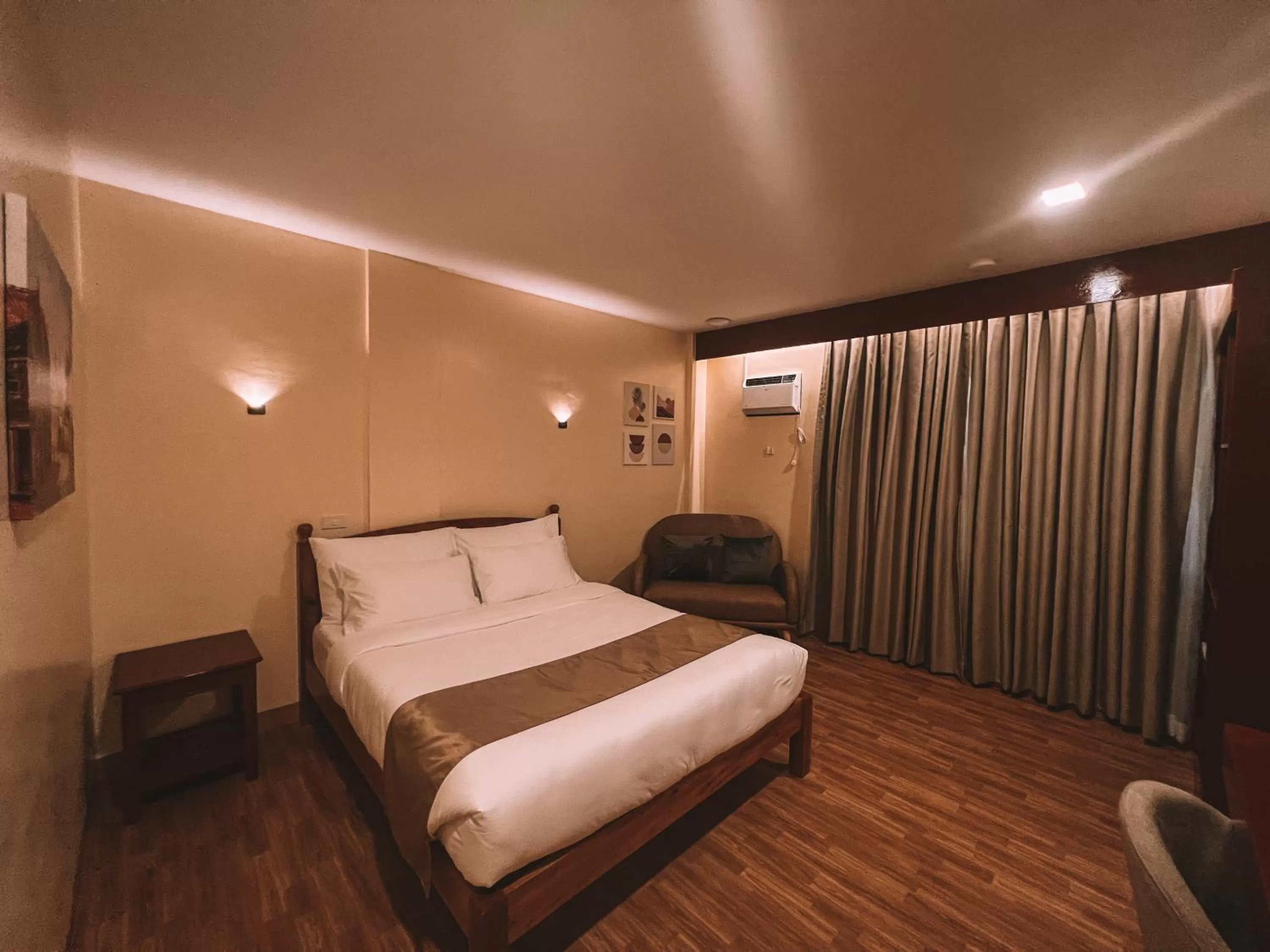 Bed in Rufana Suites