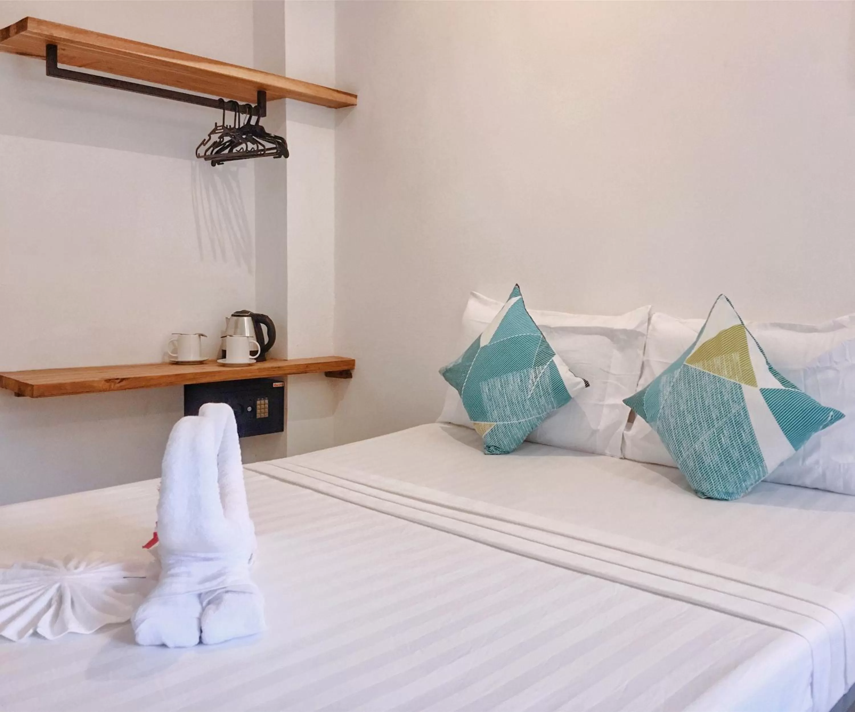 Bed in Palmera El Nido Inn