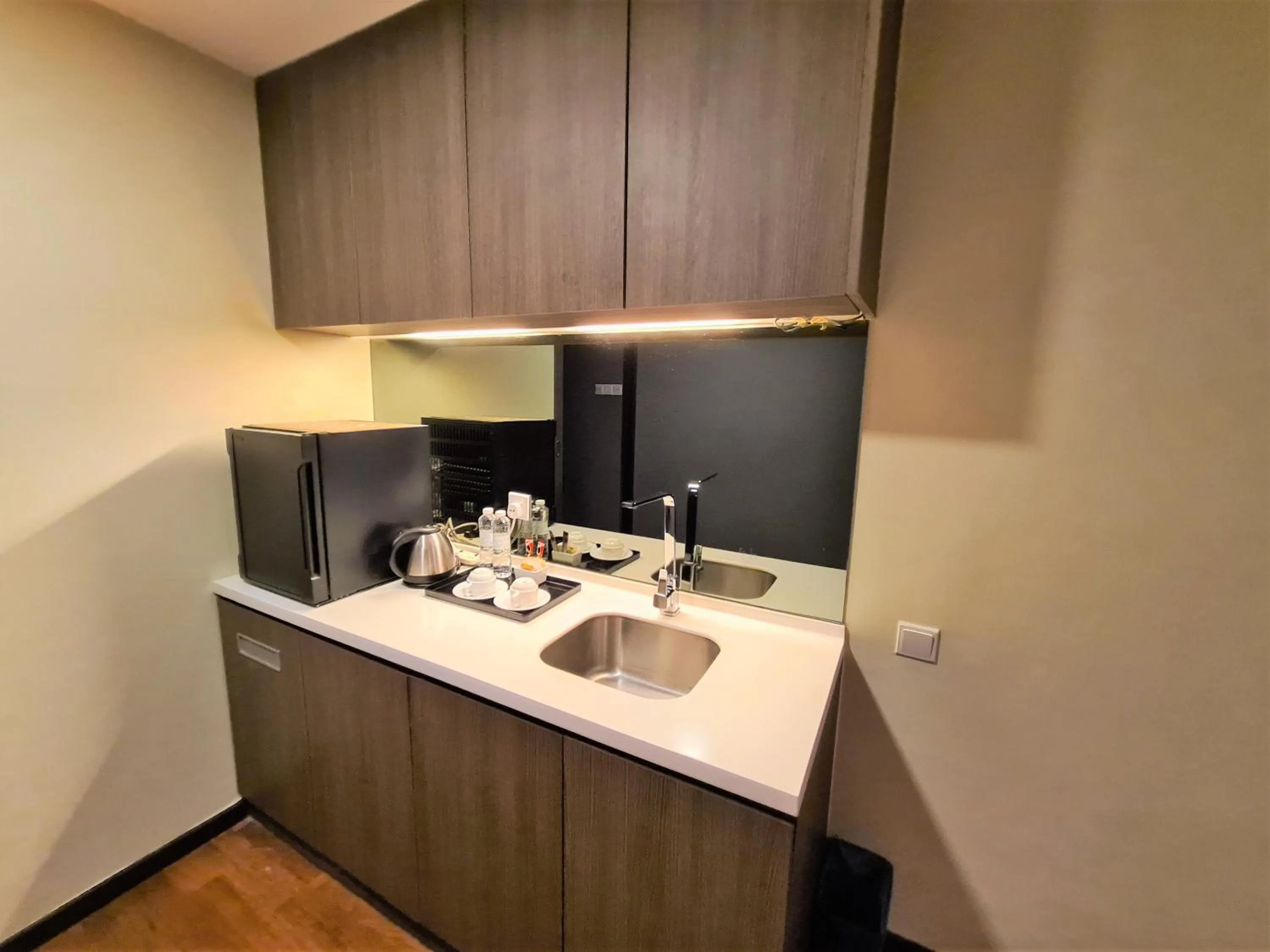 Kitchen or kitchenette in Nexus Regency Suites & Hotel