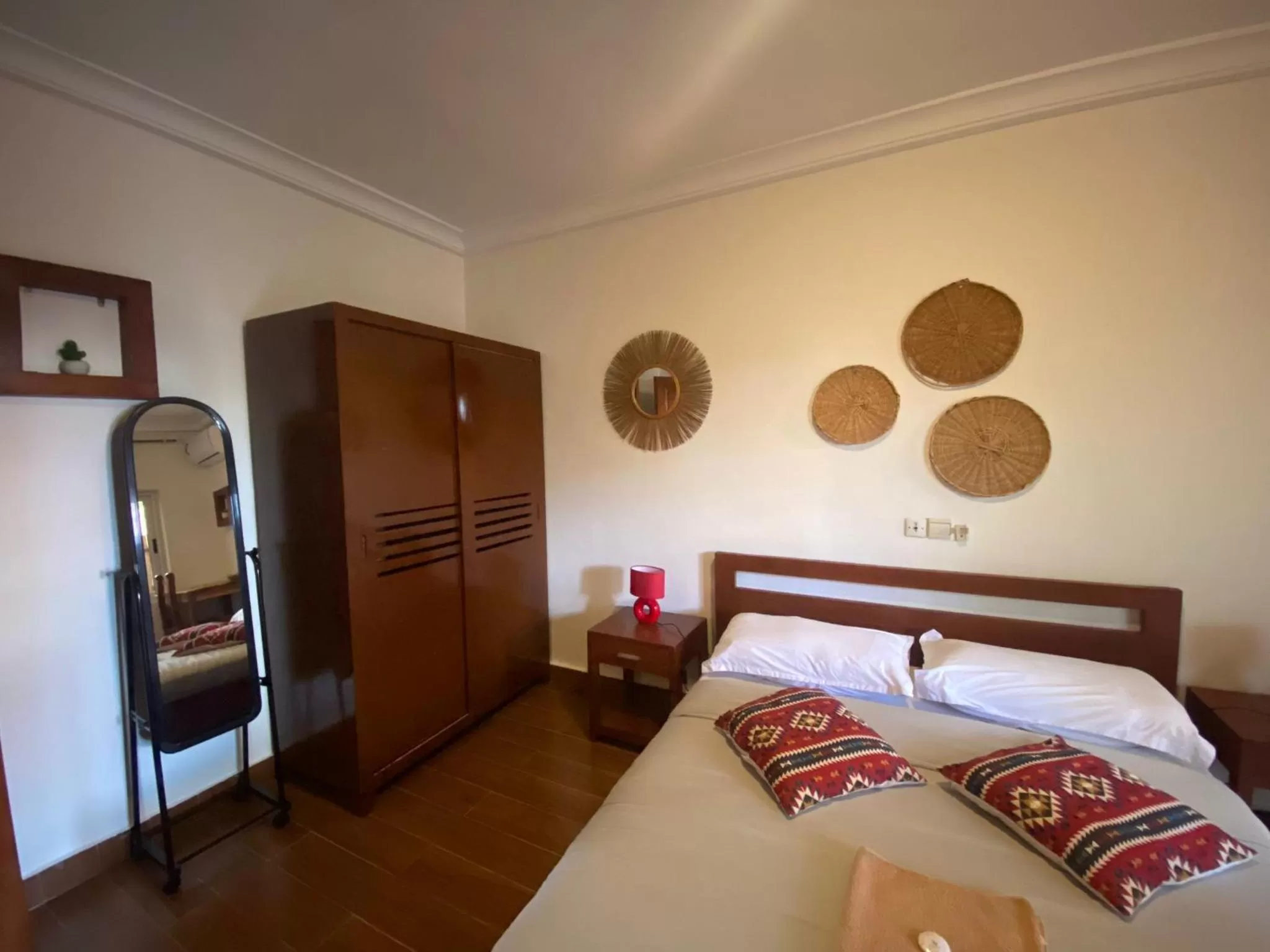 Bed in L'Oasis Guesthouse