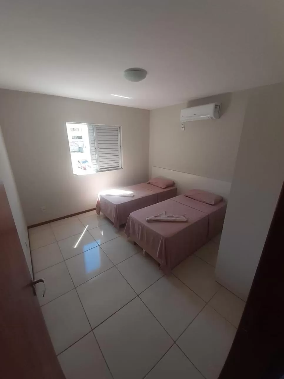 Bed in Pousada Gomes