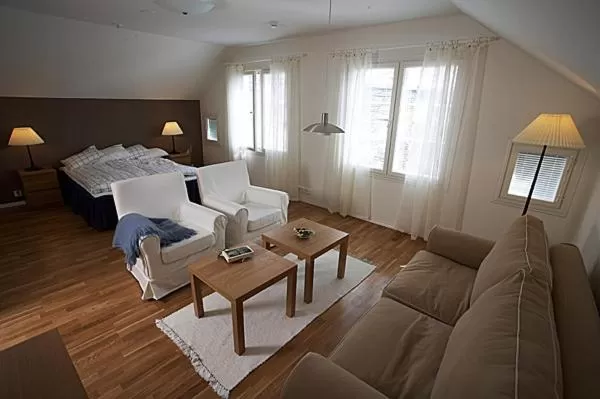 Communal lounge/ TV room, Seating Area in Varjola Holiday Center