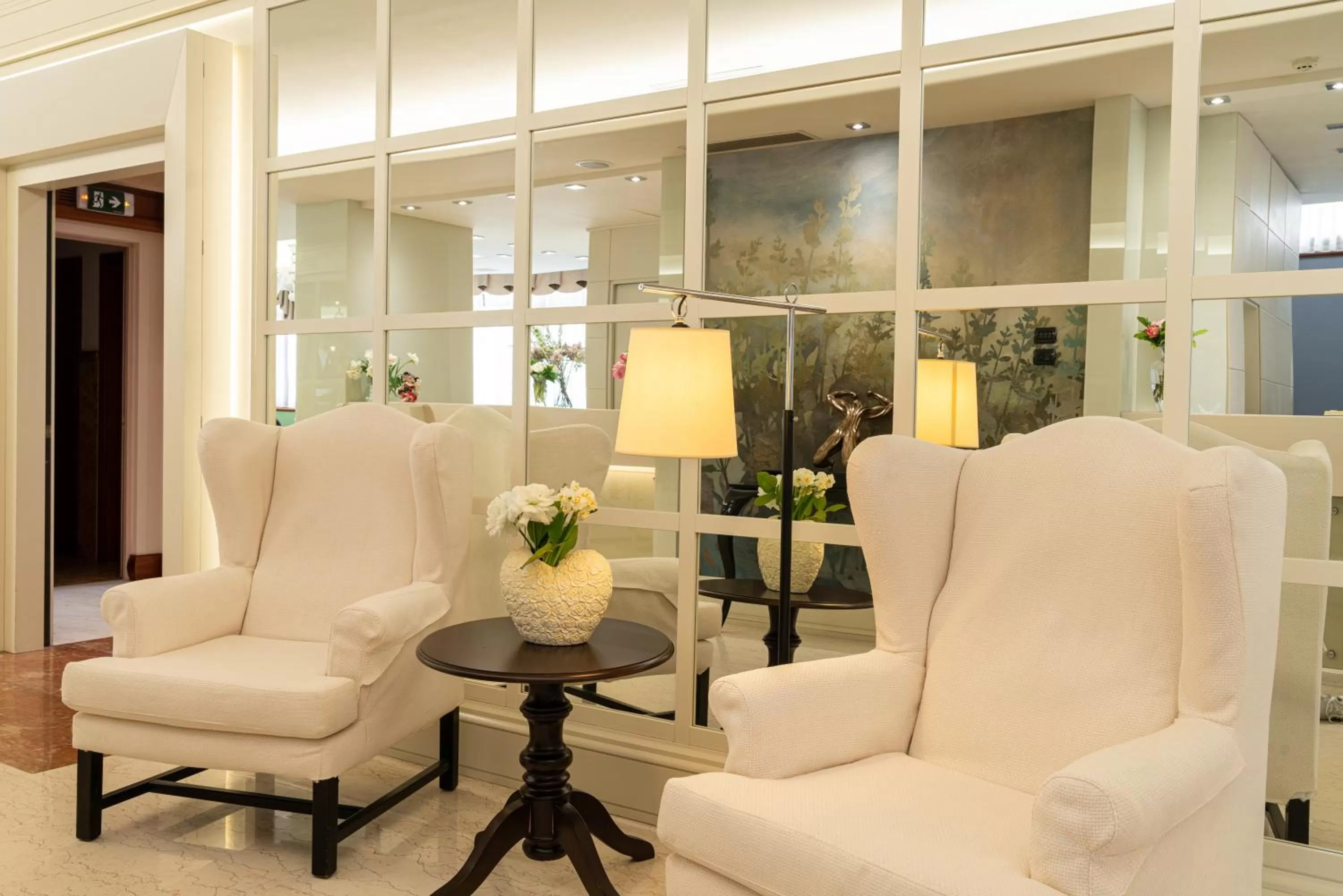 Communal lounge/ TV room in Hotel Roxy Plaza