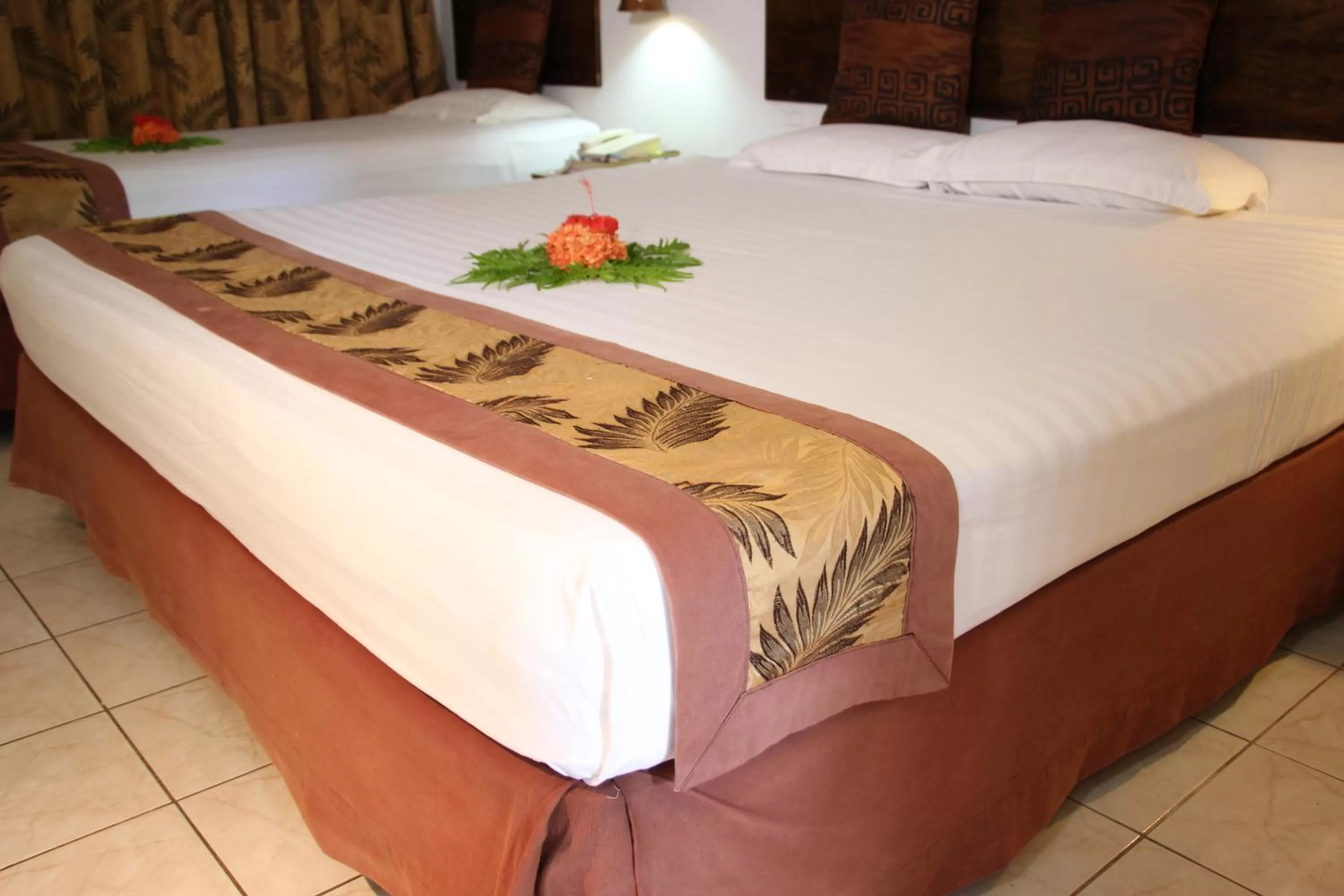 Bed in Capricorn International Hotel