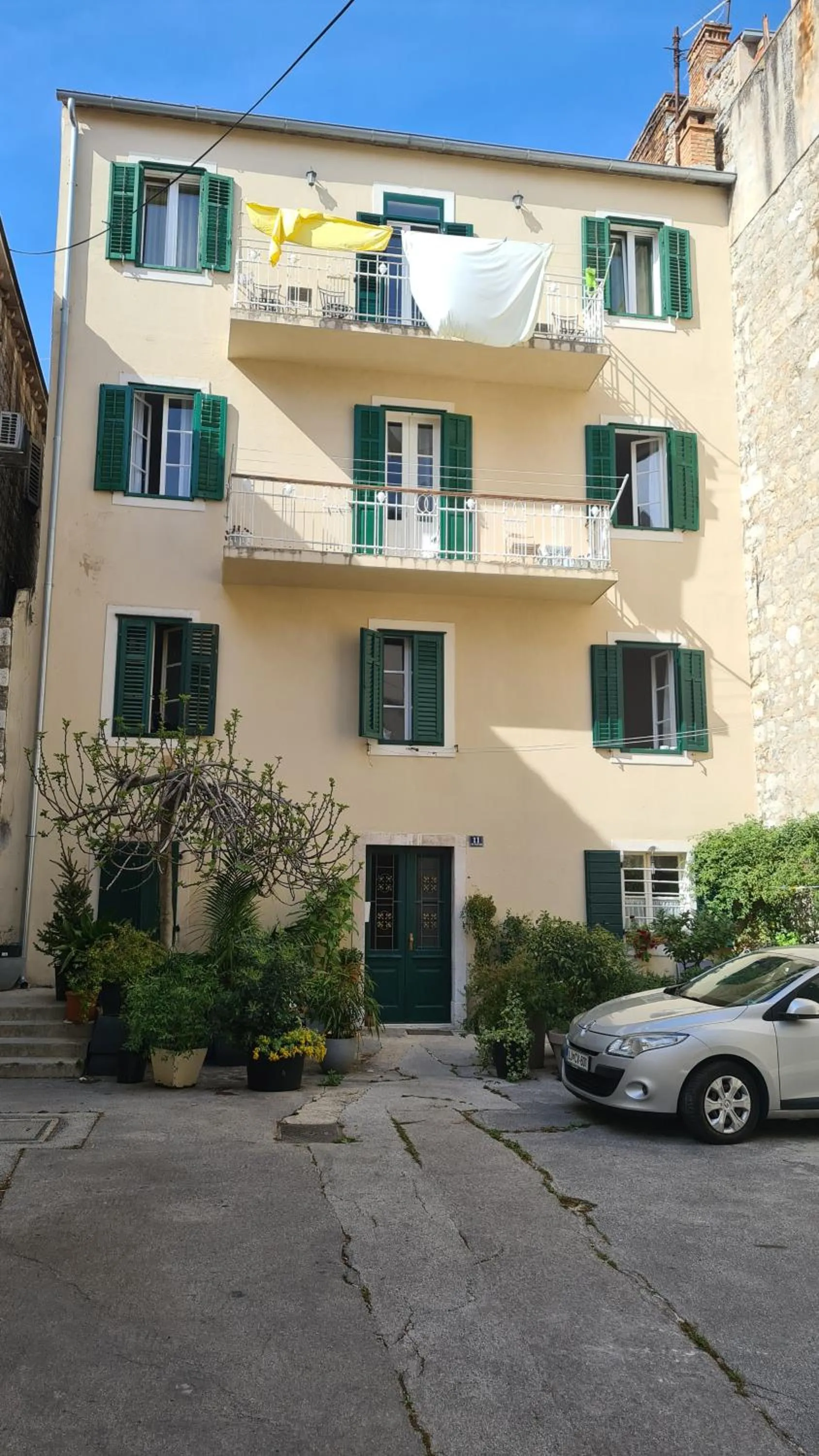 Property building in Apartment Central Old town with private indoor garage parking