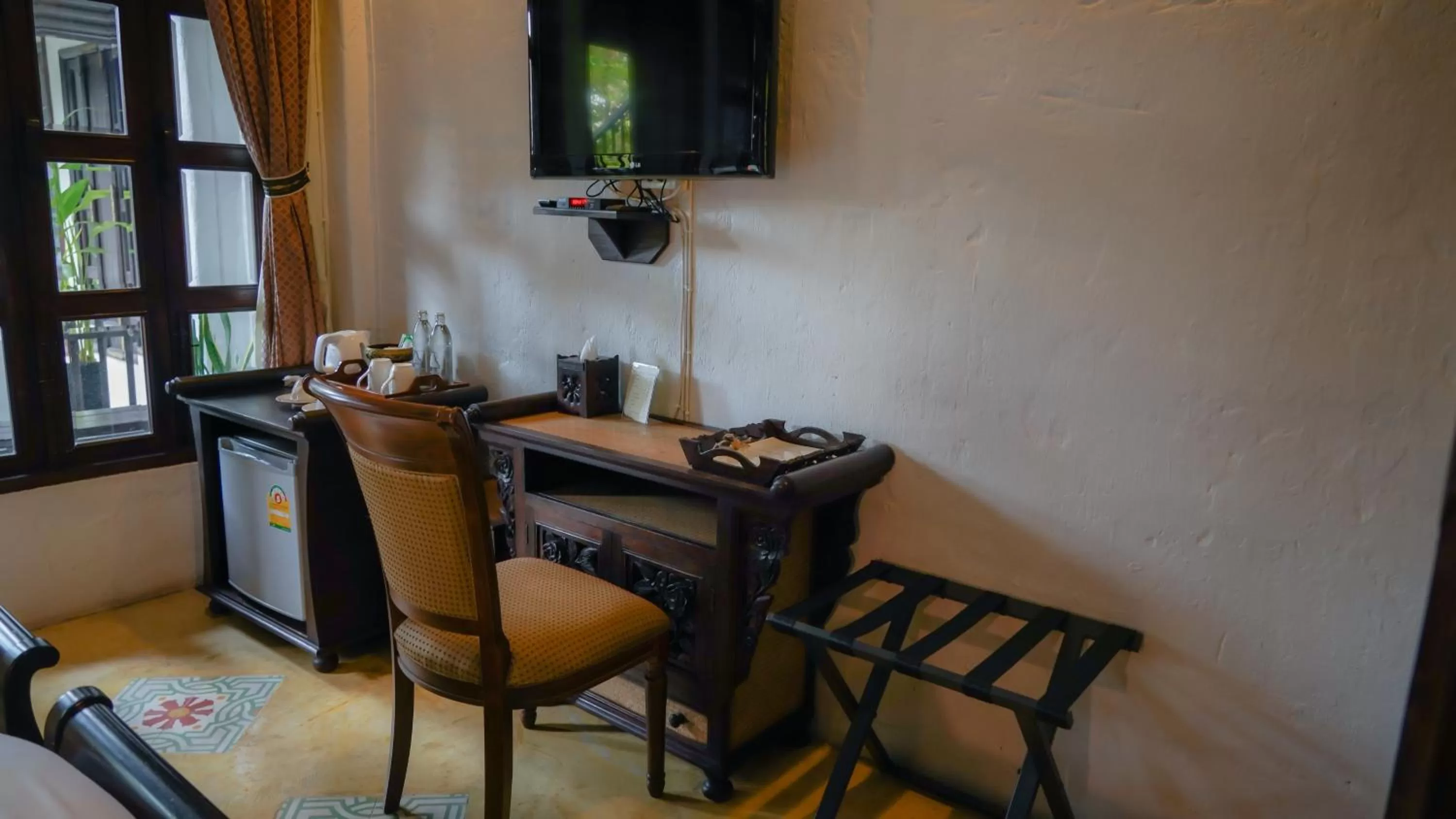 Decorative detail, TV/Entertainment Center in Cheva Gallery Boutique Hotel