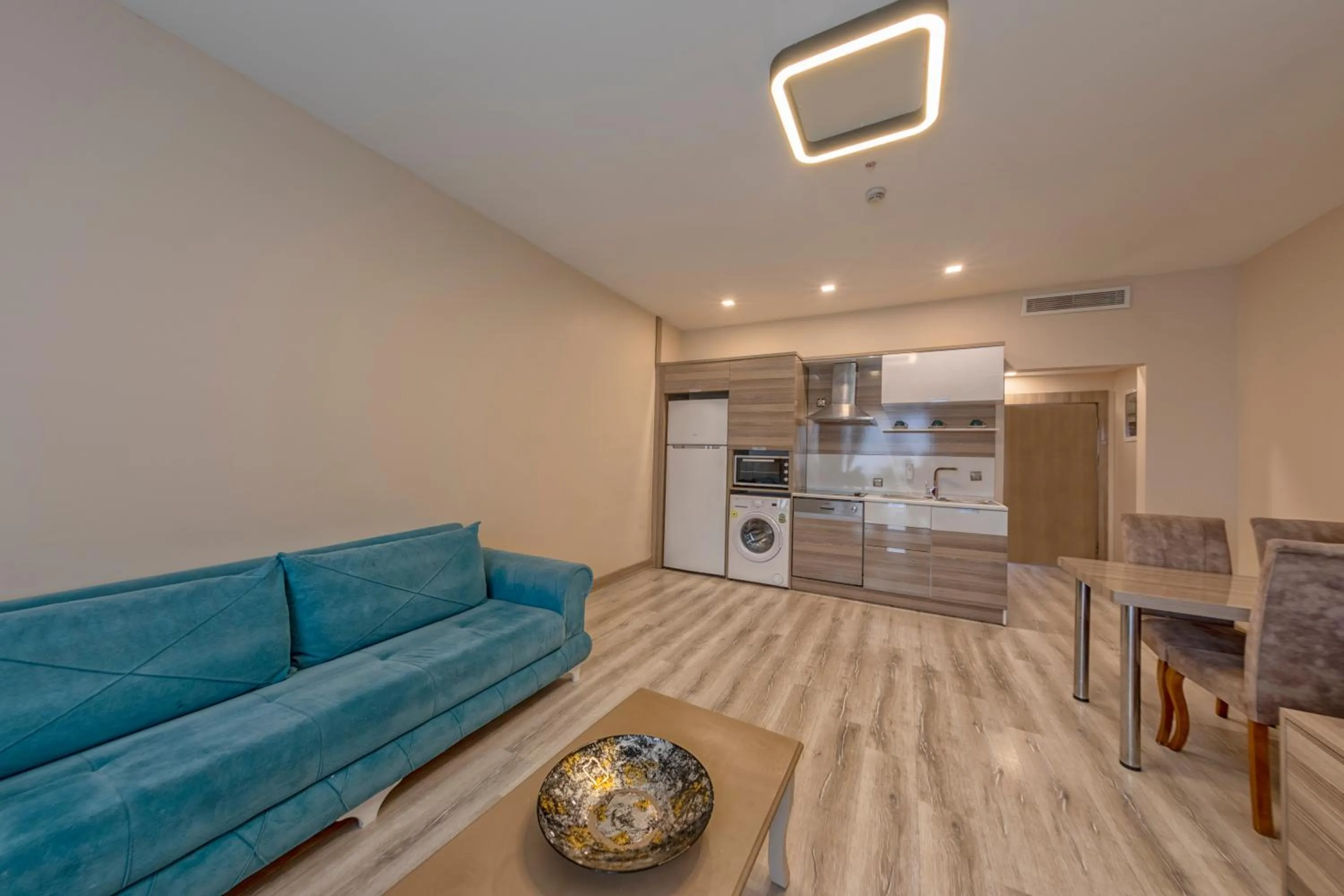 Kitchen or kitchenette in My House N5 Suites Hotel