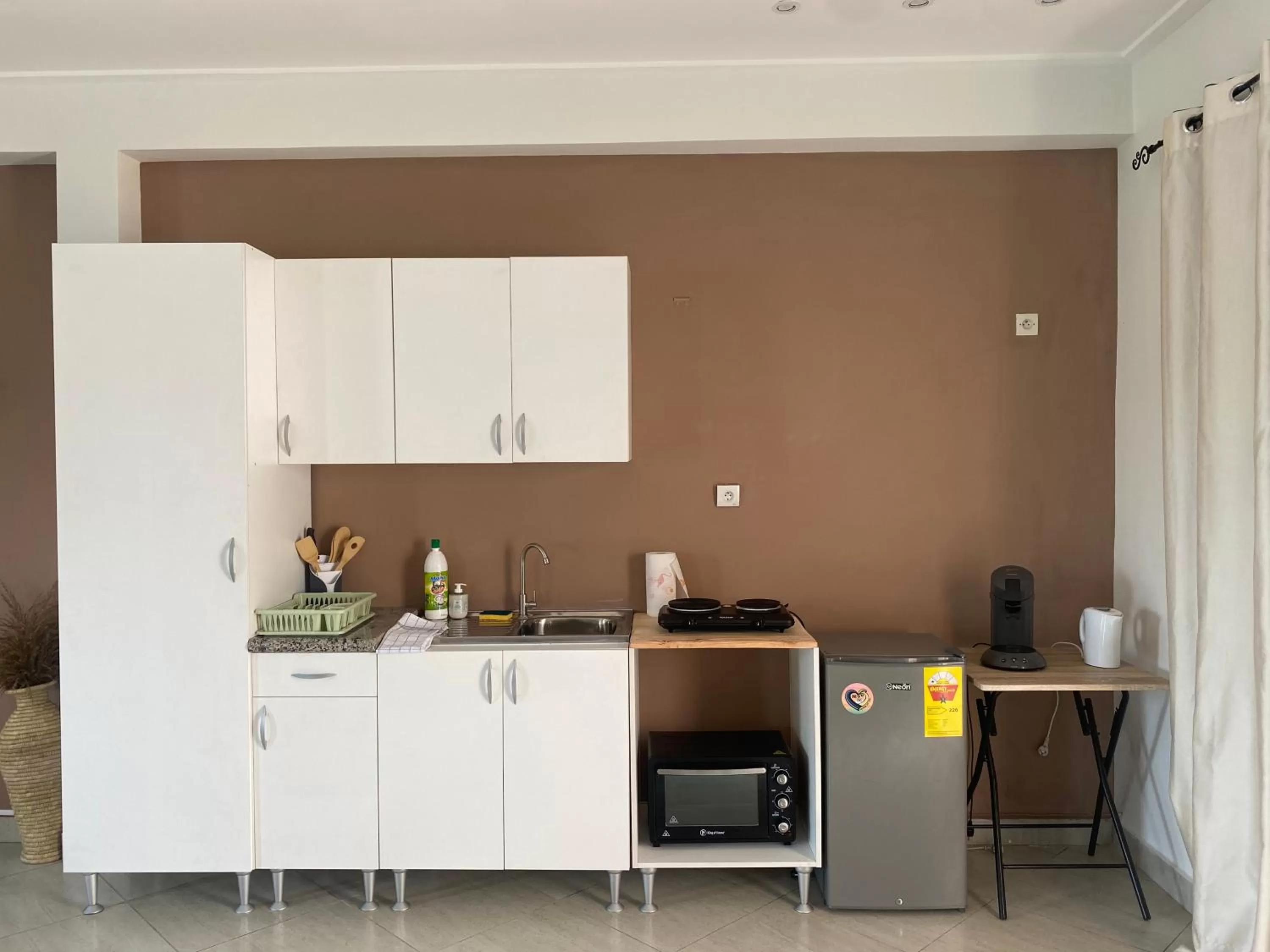 Kitchen/Kitchenette in L'Oasis Guesthouse