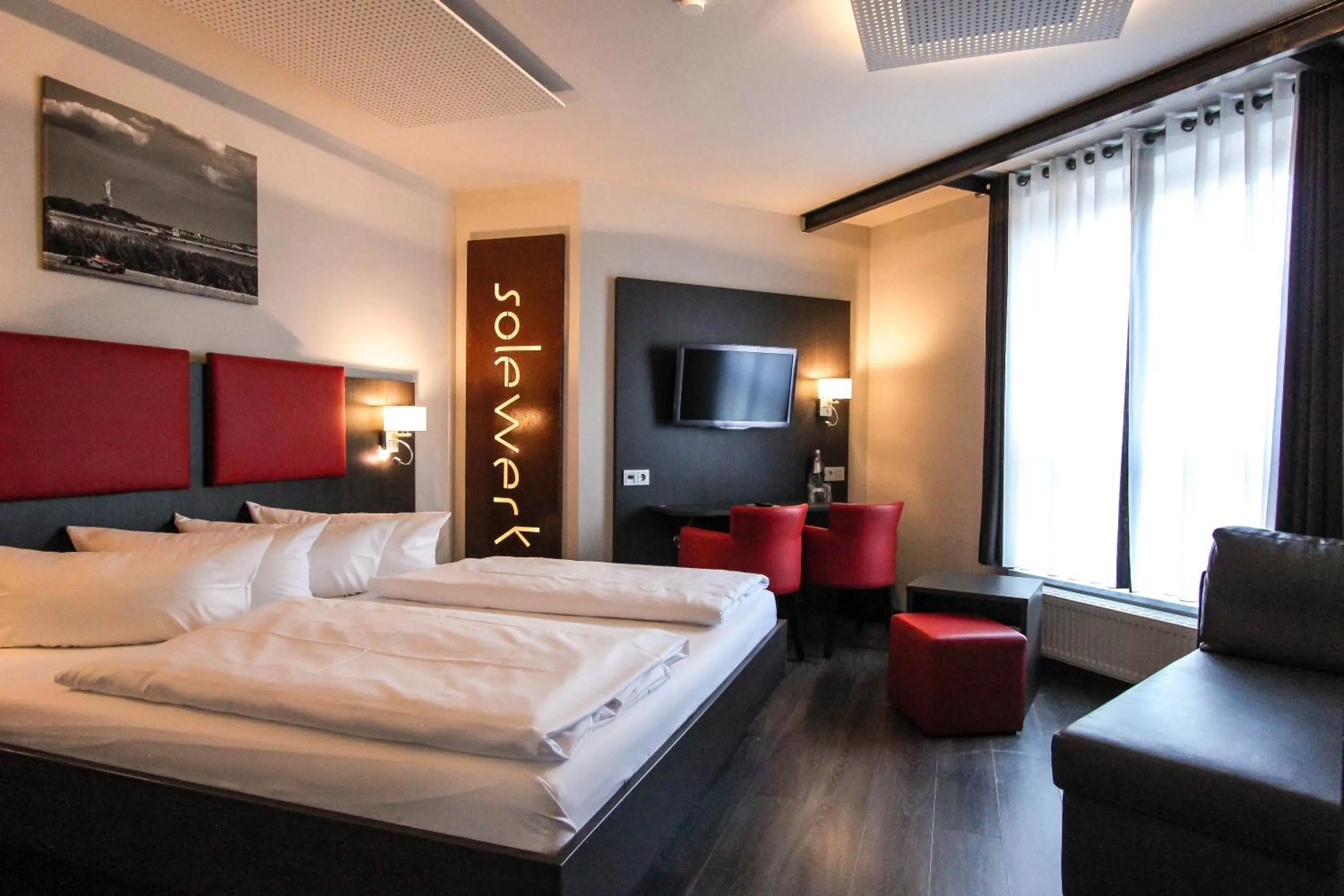Photo of the whole room, Bed in SOLEWERK Hotel