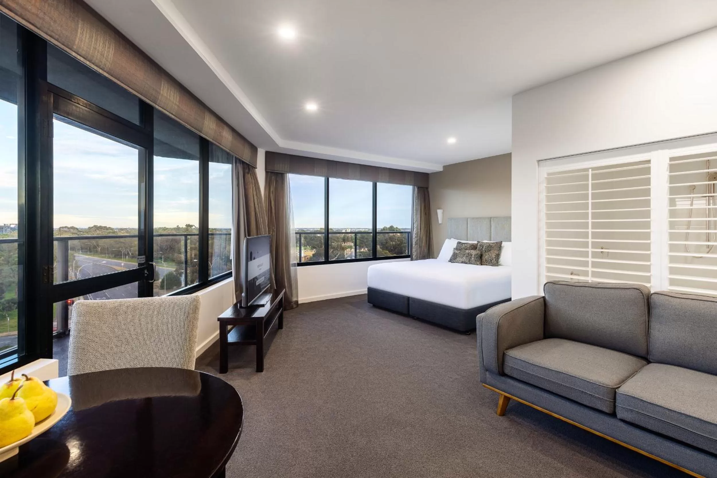 Living room, Bed in Rydges South Park Adelaide