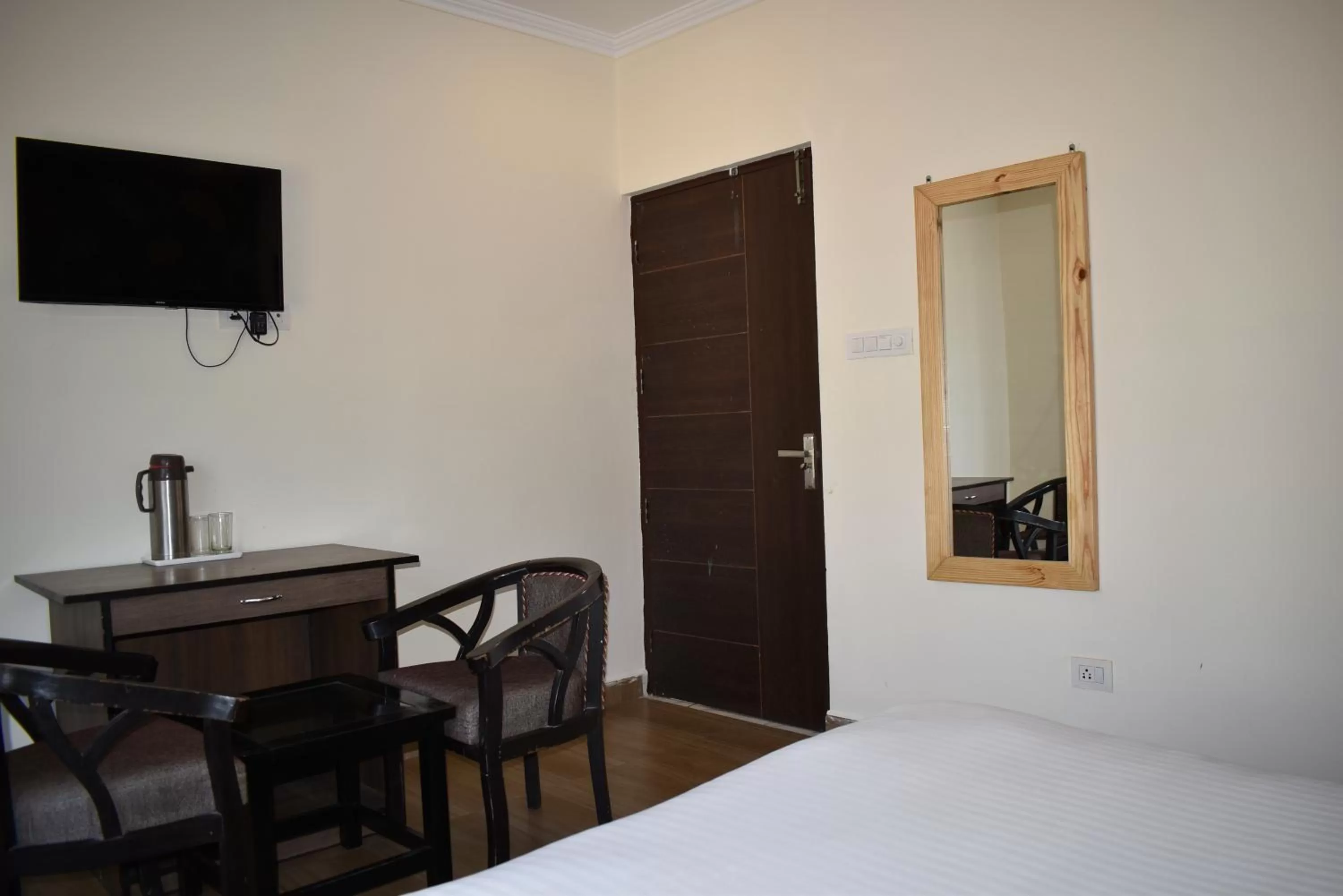 TV and multimedia, TV/Entertainment Center in Tapasthali by Meera Hotels