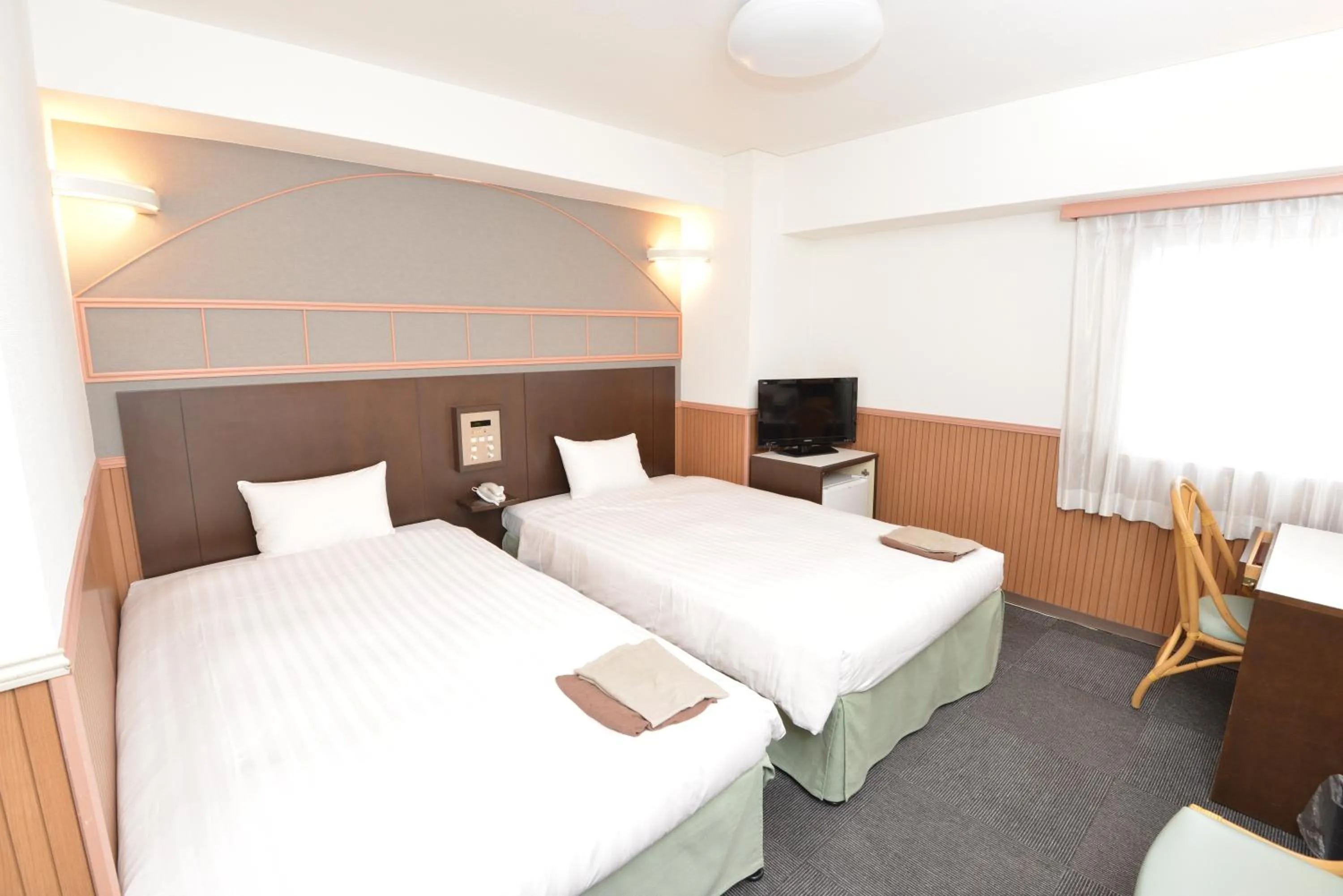 Bed in Hotel Marutani