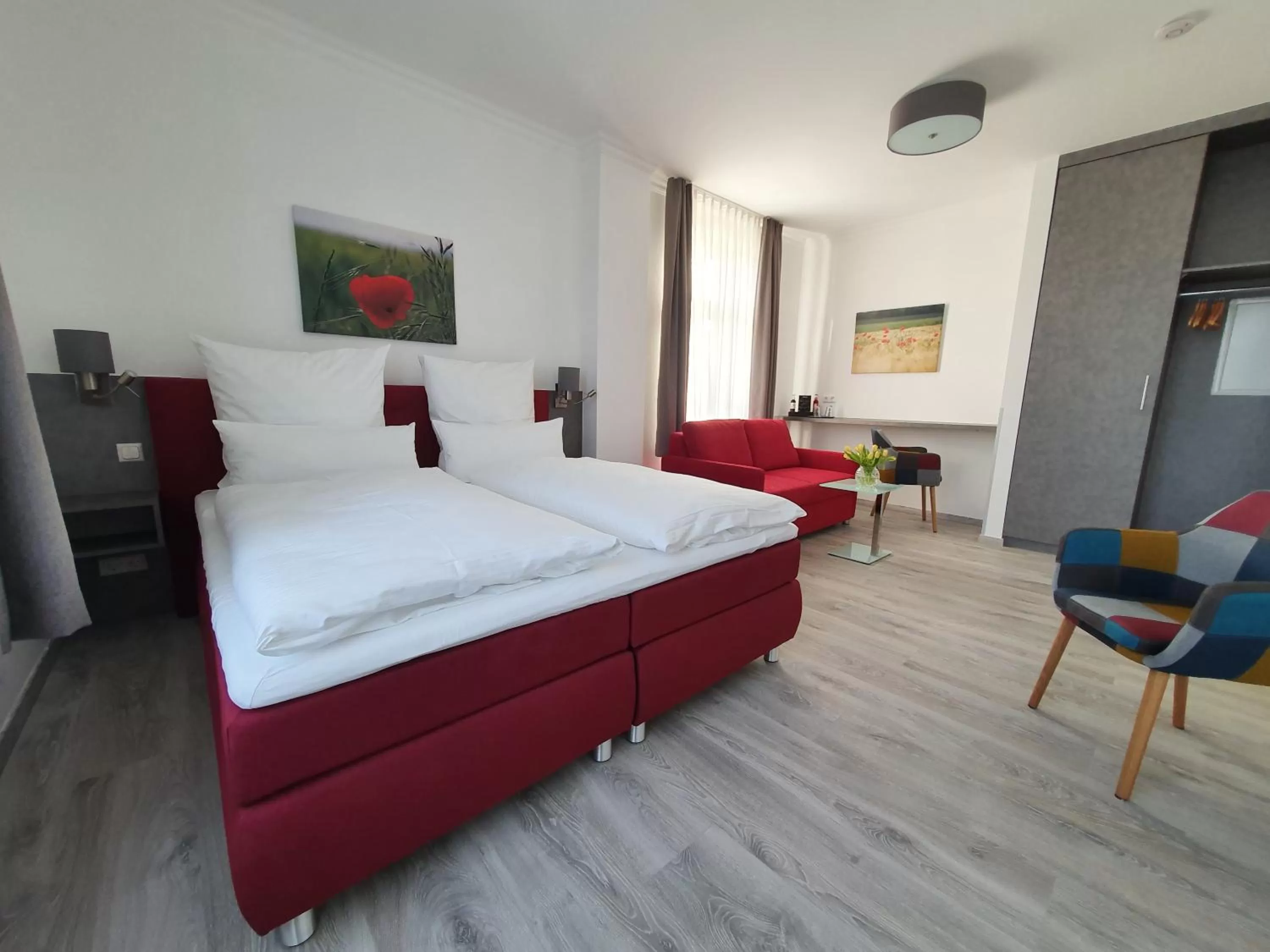 Photo of the whole room, Bed in Hotel Hanseat Stralsund