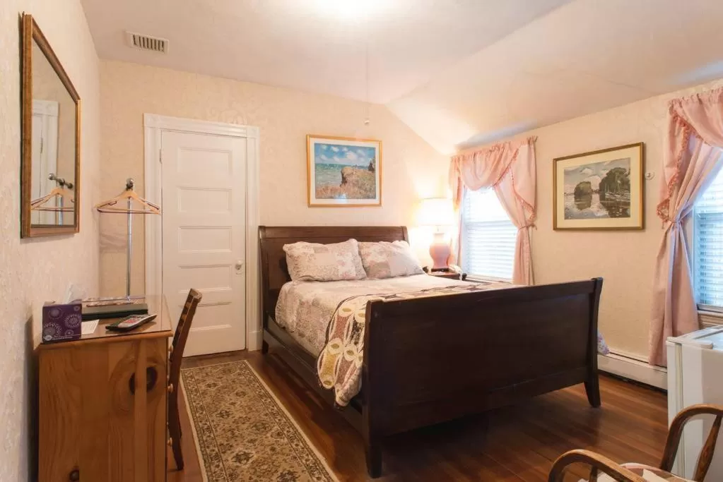 Bed in The Coolidge Corner Guest House: A Brookline Bed and Breakfast