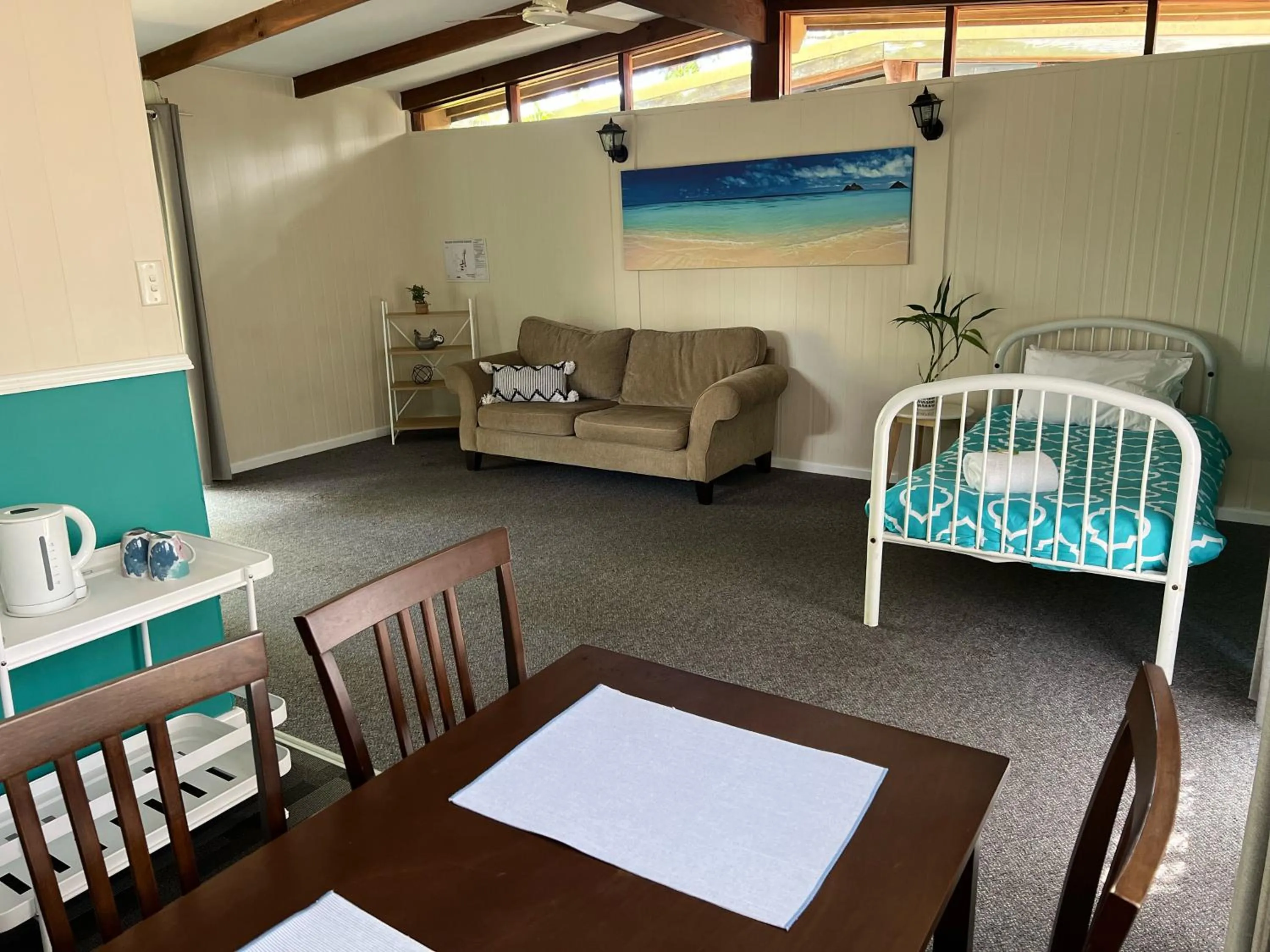 Bed in Colonial Village Resort