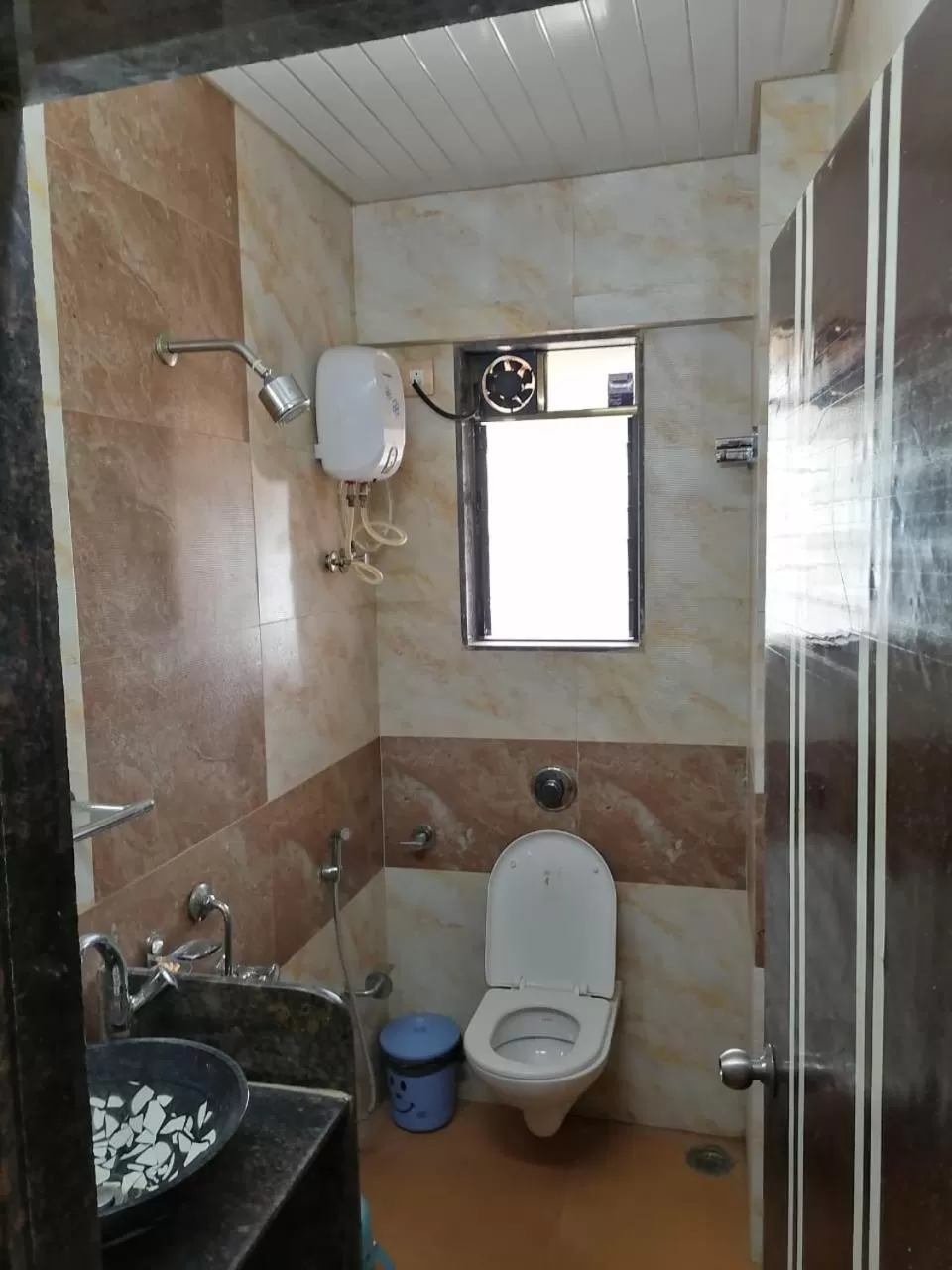 Bathroom in Pooja Villa Suites-Rooms and Pool, Igatpuri