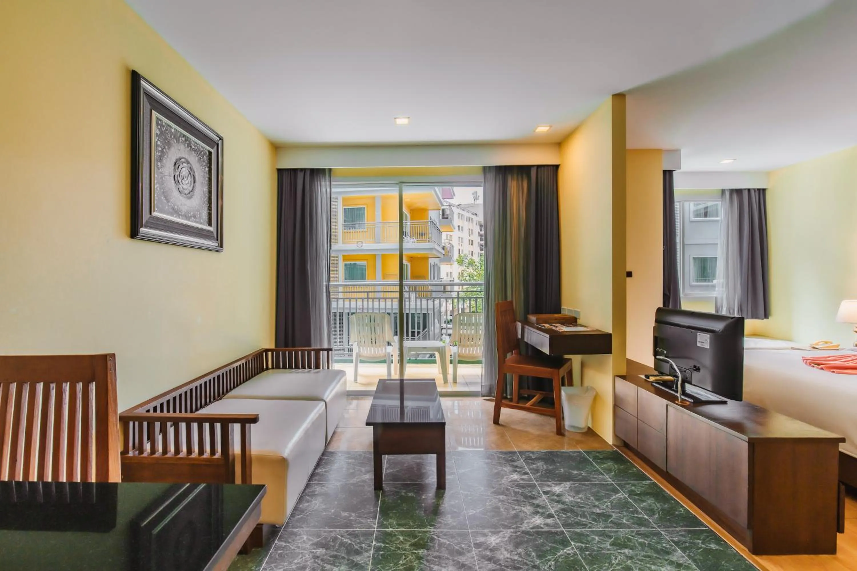 Seating area, Bed in Elite Suites Patong