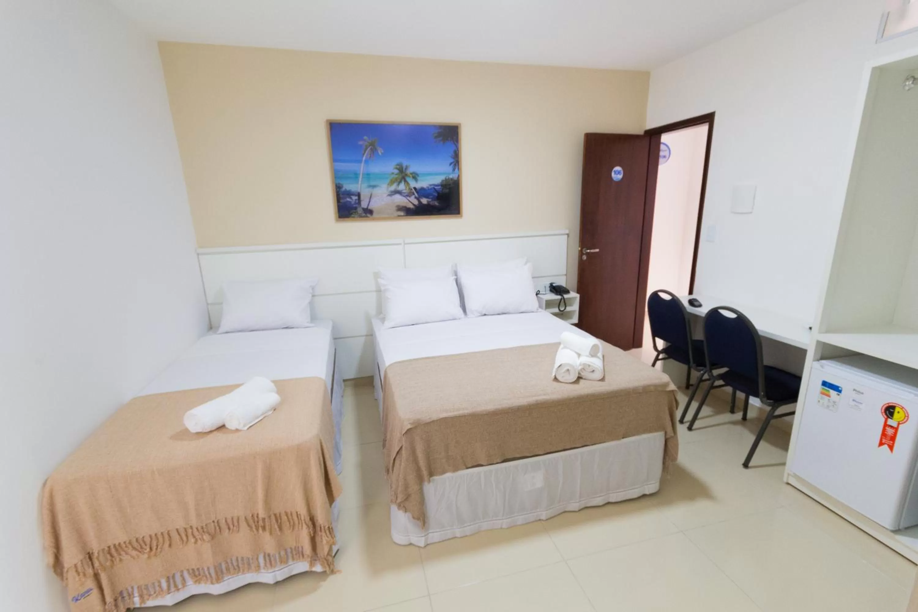 Bed in Pousada Kanoas