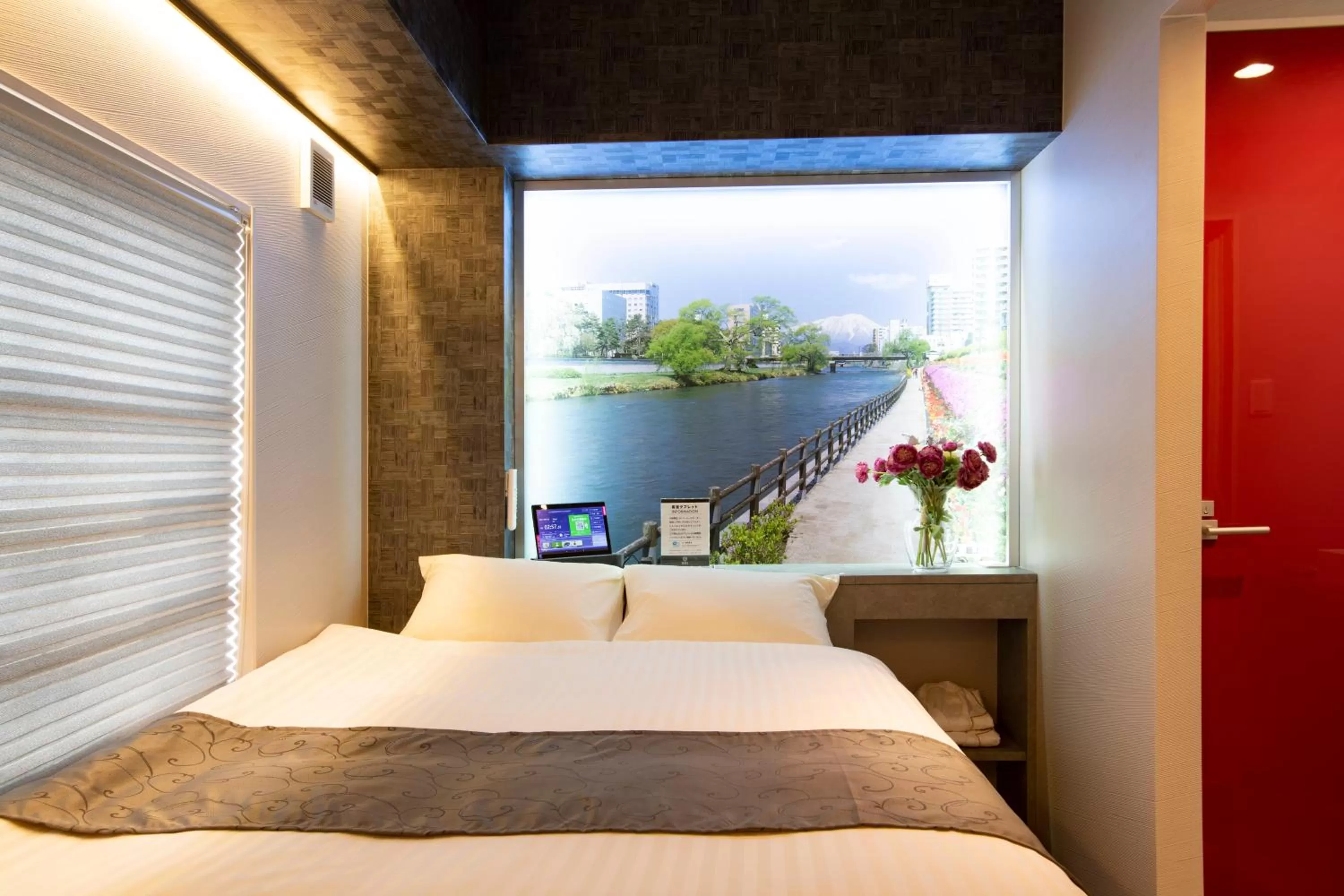 Bed in Pinpon Hotel Hiroshima