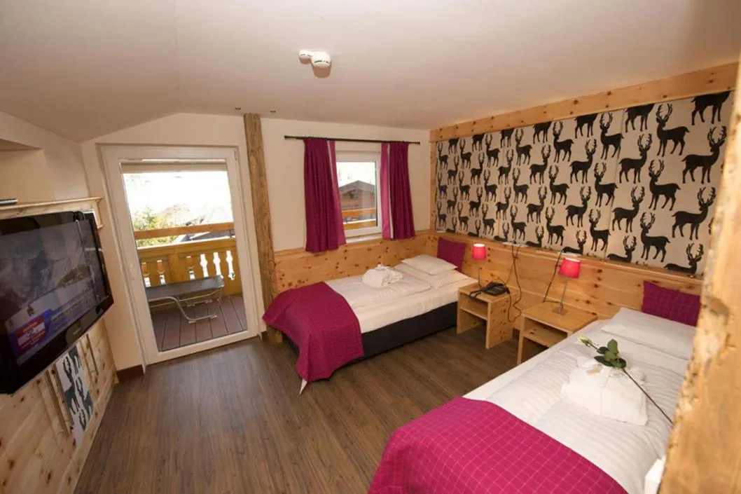 Bed in JUFA Alpenhotel Saalbach