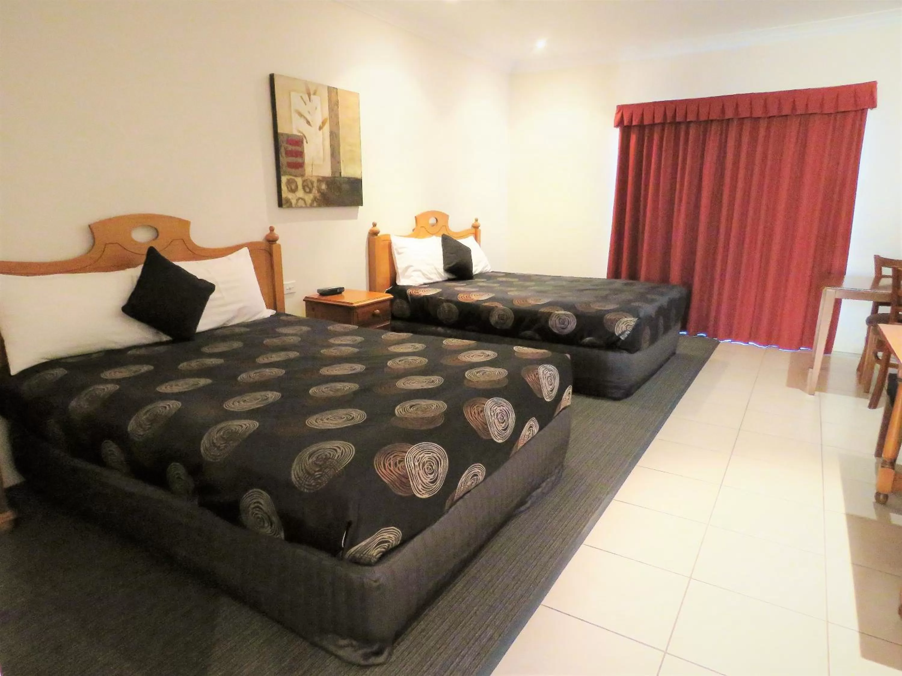 Bed in Emerald Gardens Motel & Apartments