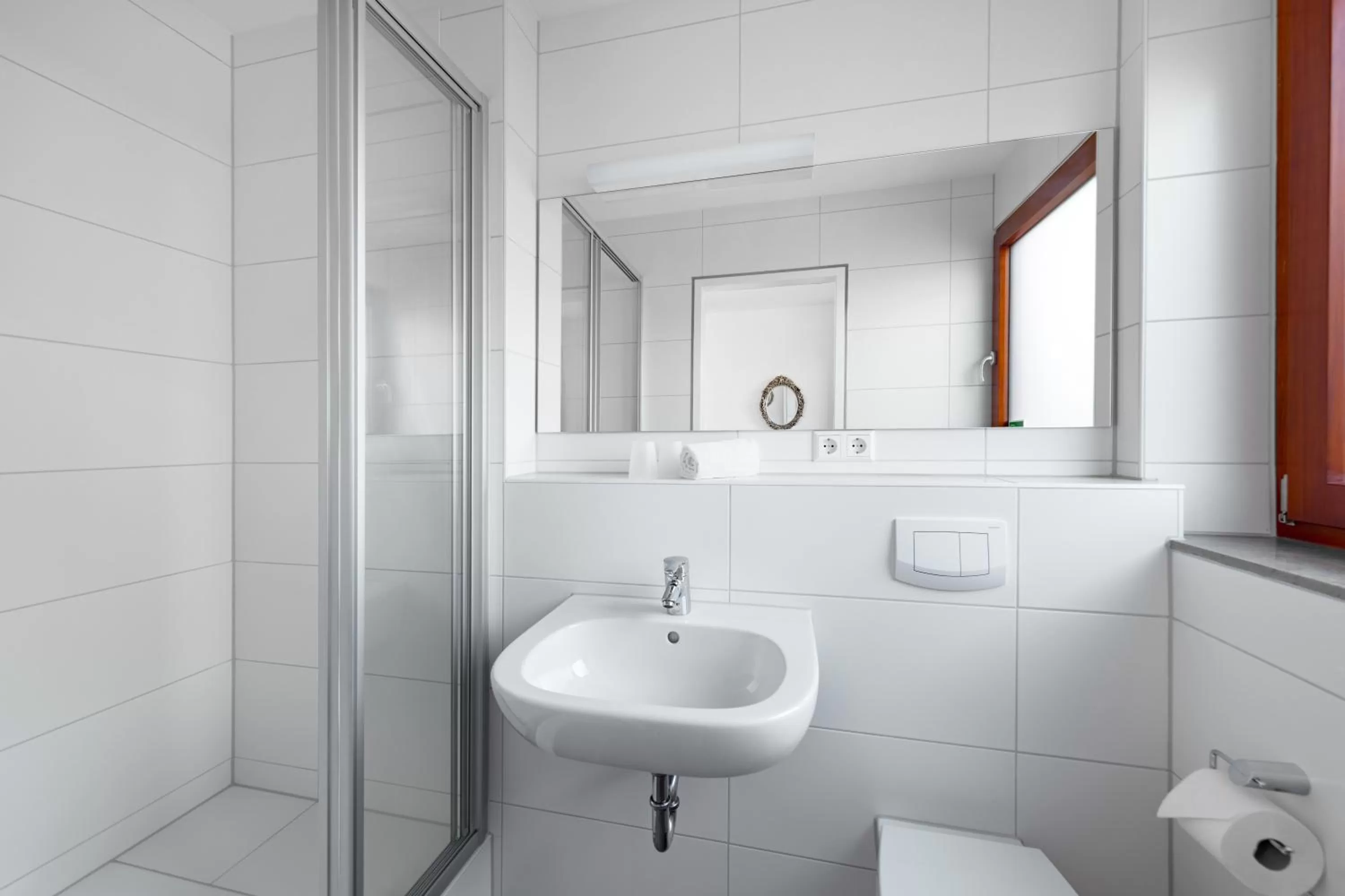 Bathroom in Hotel Garni am Olgaeck