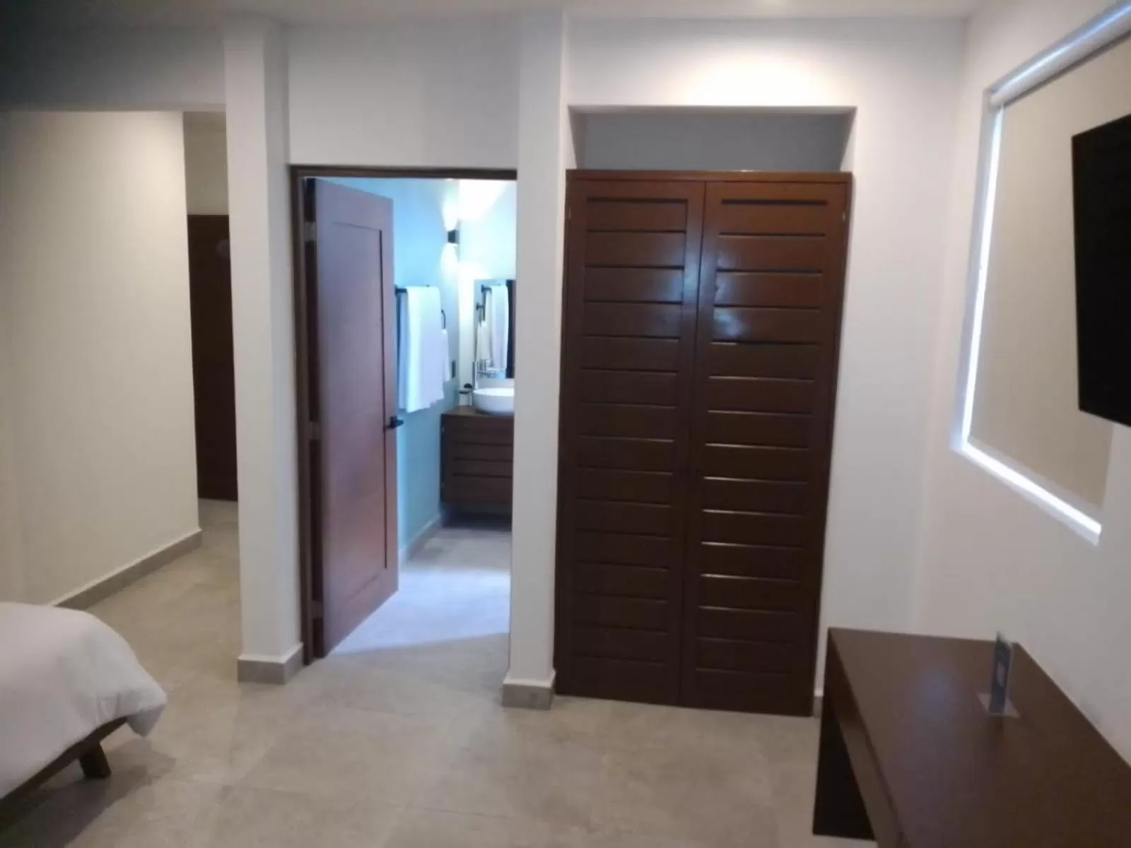 Photo of the whole room, TV/Entertainment Center in Mura Hotel Boutique