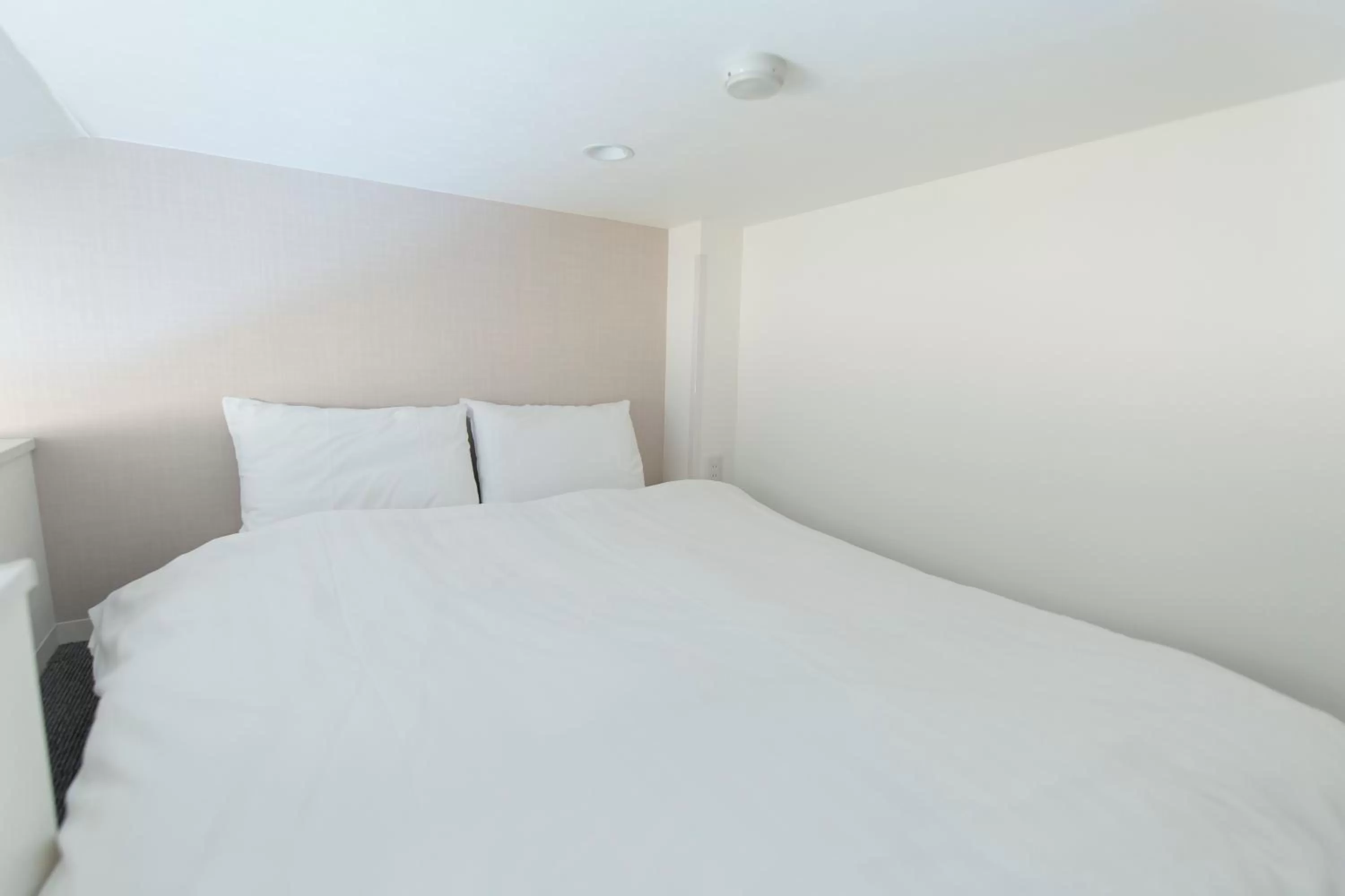 On site, Bed in GLOU Higashi Shinjuku