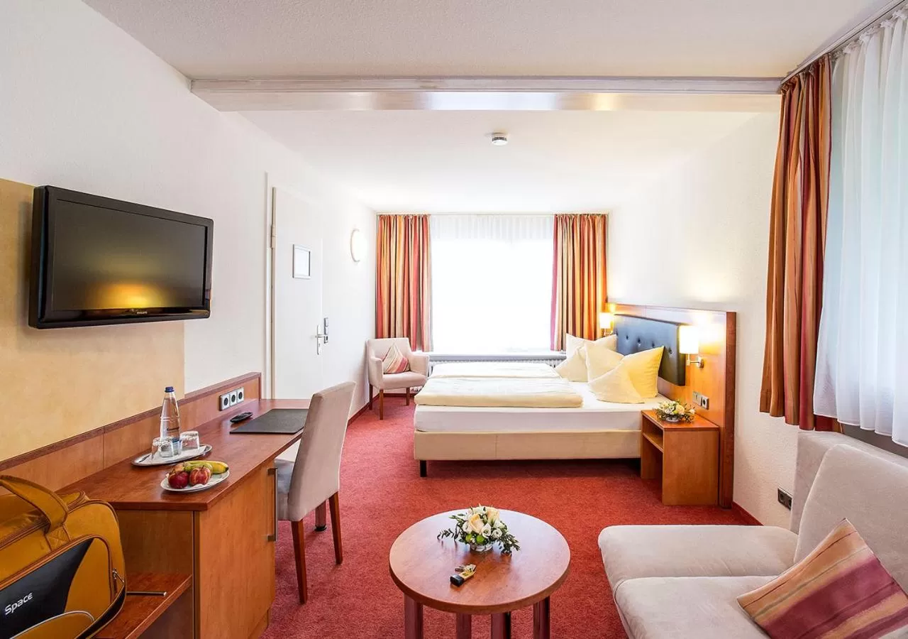 Photo of the whole room, TV/Entertainment Center in Portens Hotel Fernblick