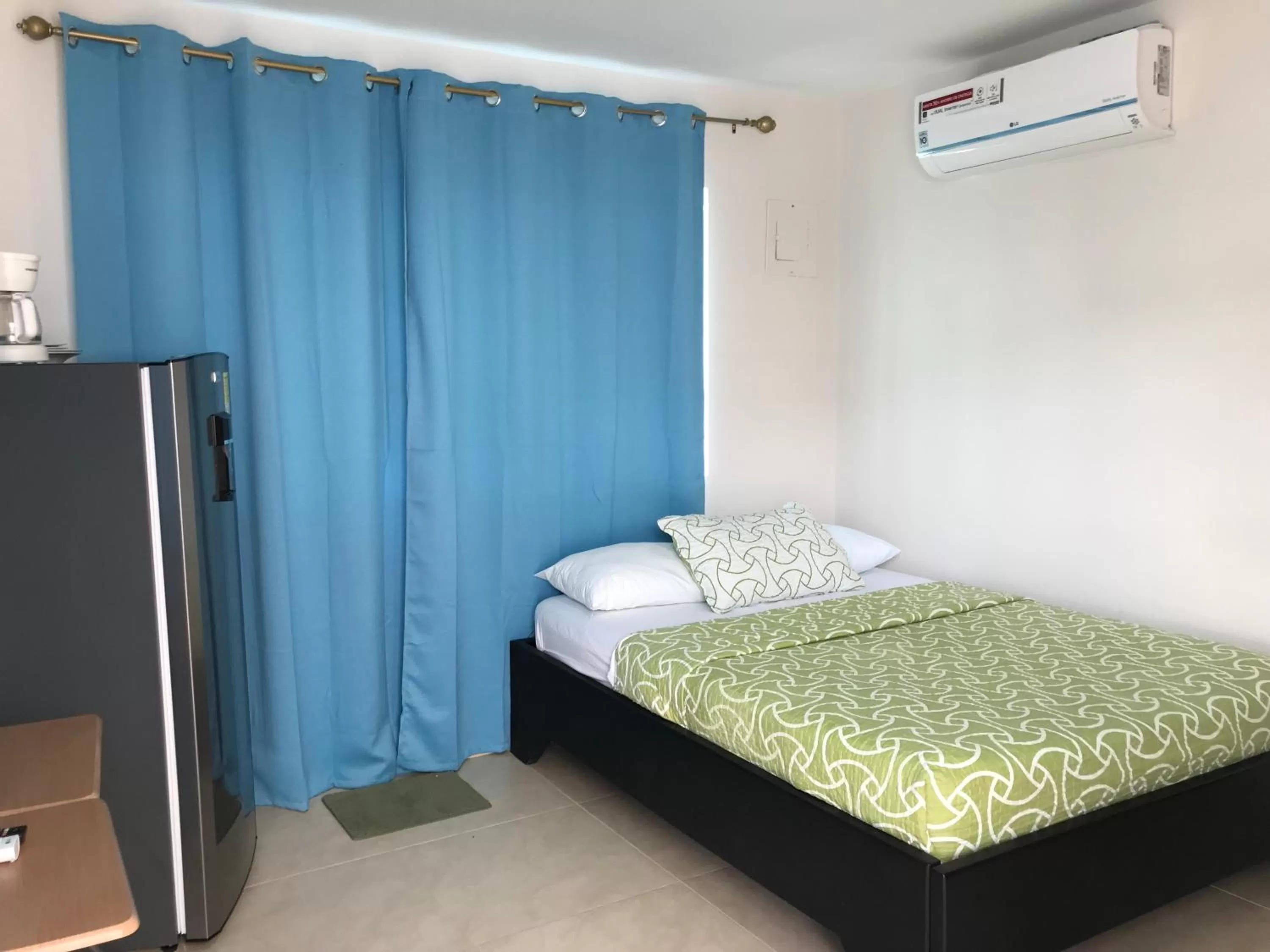 Bed in Caribbean Island Hotel Piso 2