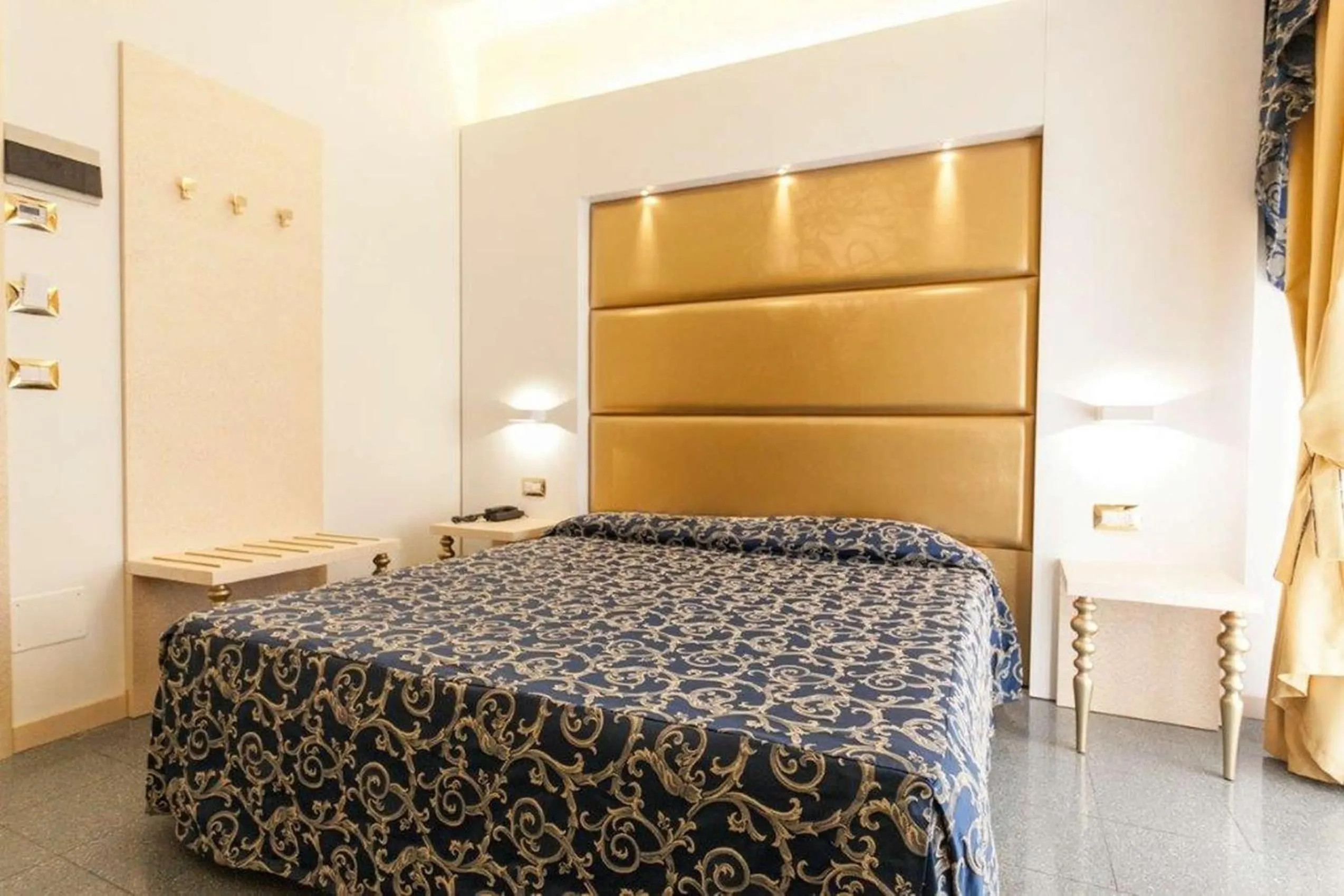 Bed in Hotel Ambassador