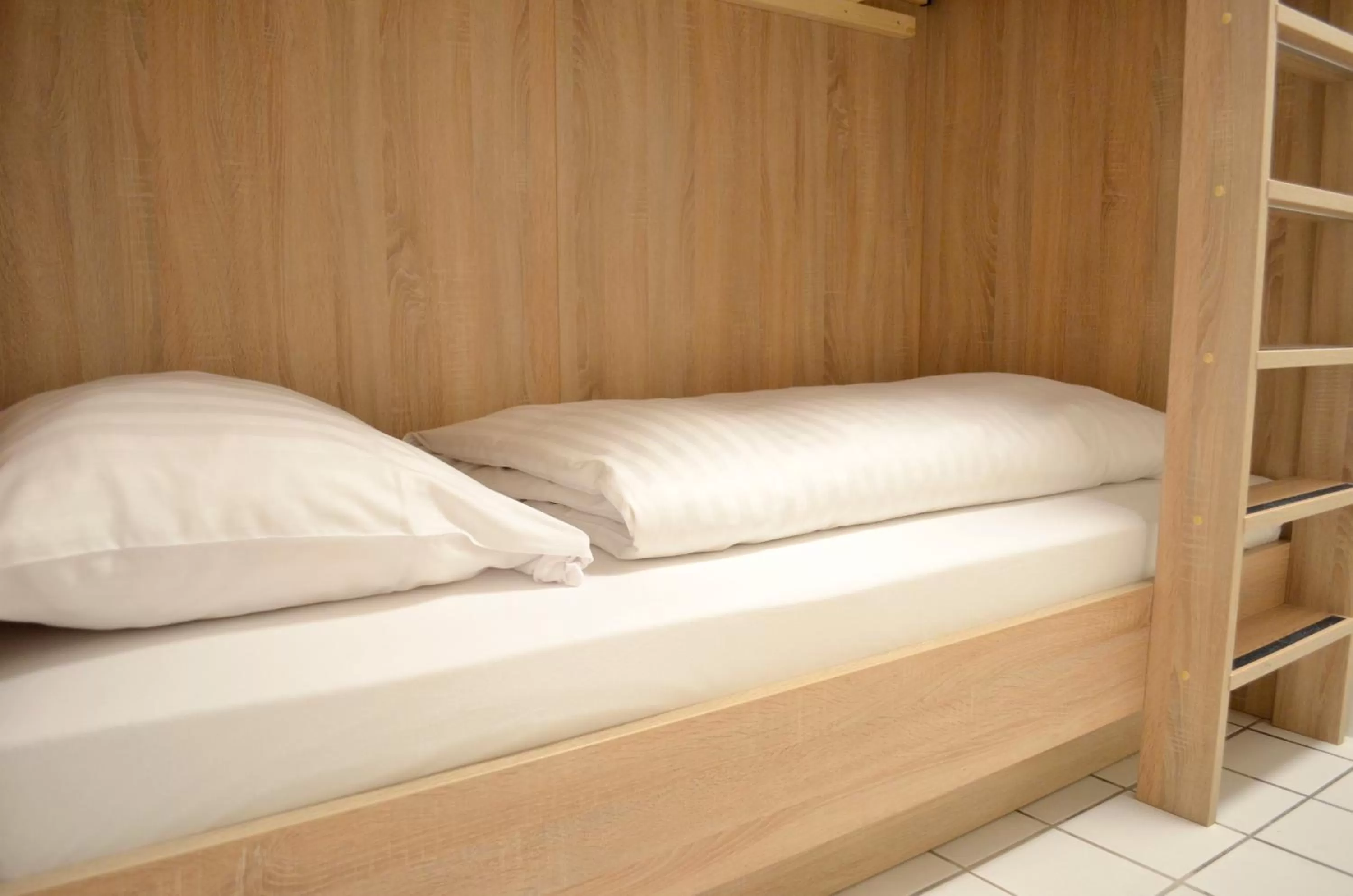 Bed in Hana Aparthotel