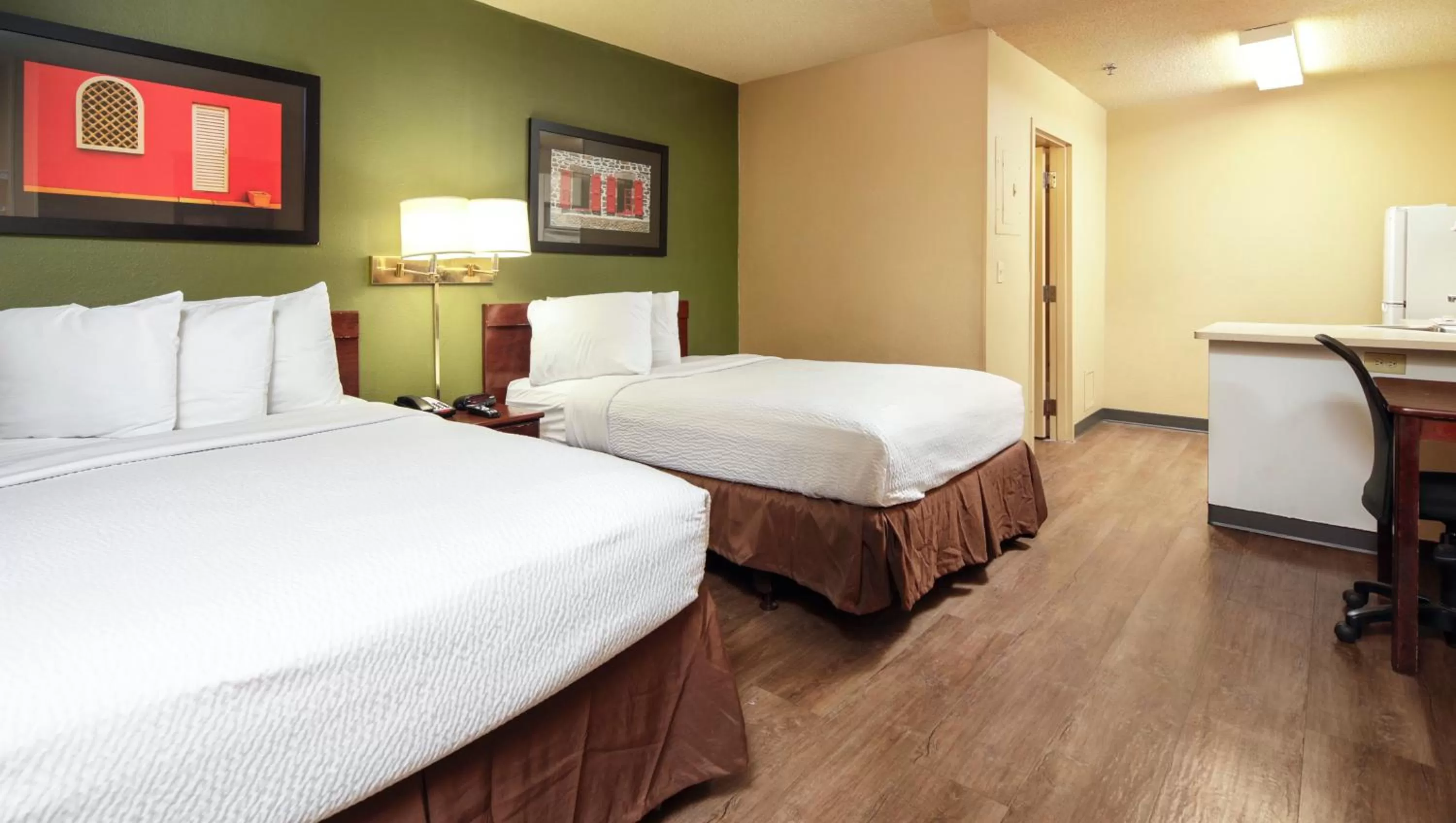 Bedroom, Bed in Home 1 Suites Extended Stay