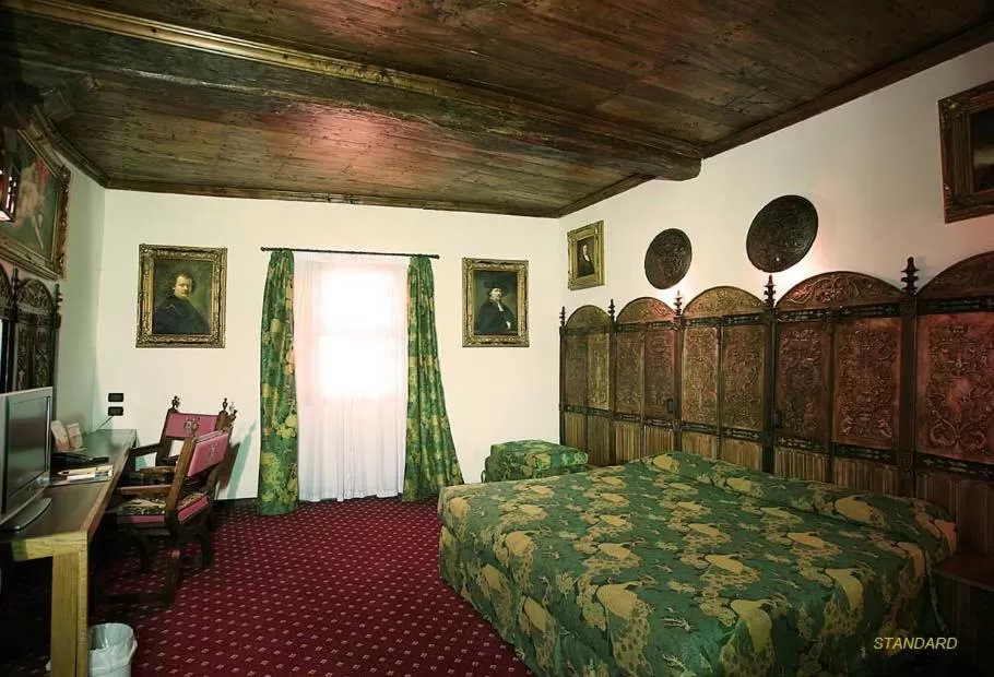 Photo of the whole room, Bed in Castello Di Pavone