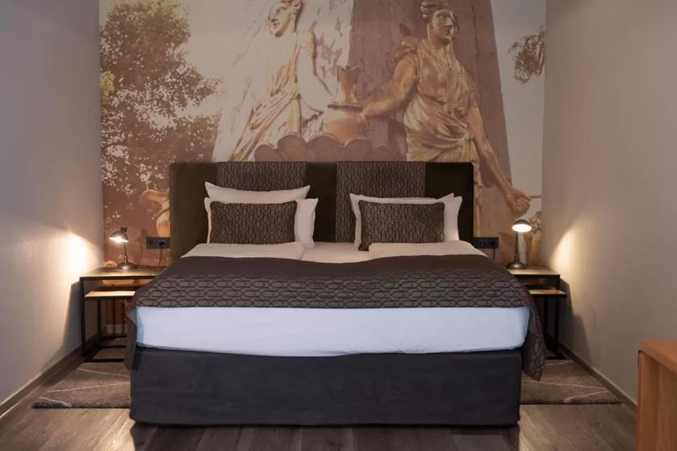 Bed in Art Hotel Superior