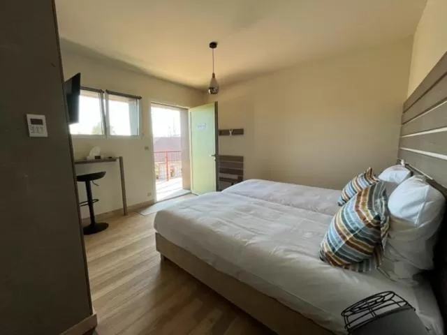 Bed in Hôtel En Tilleul