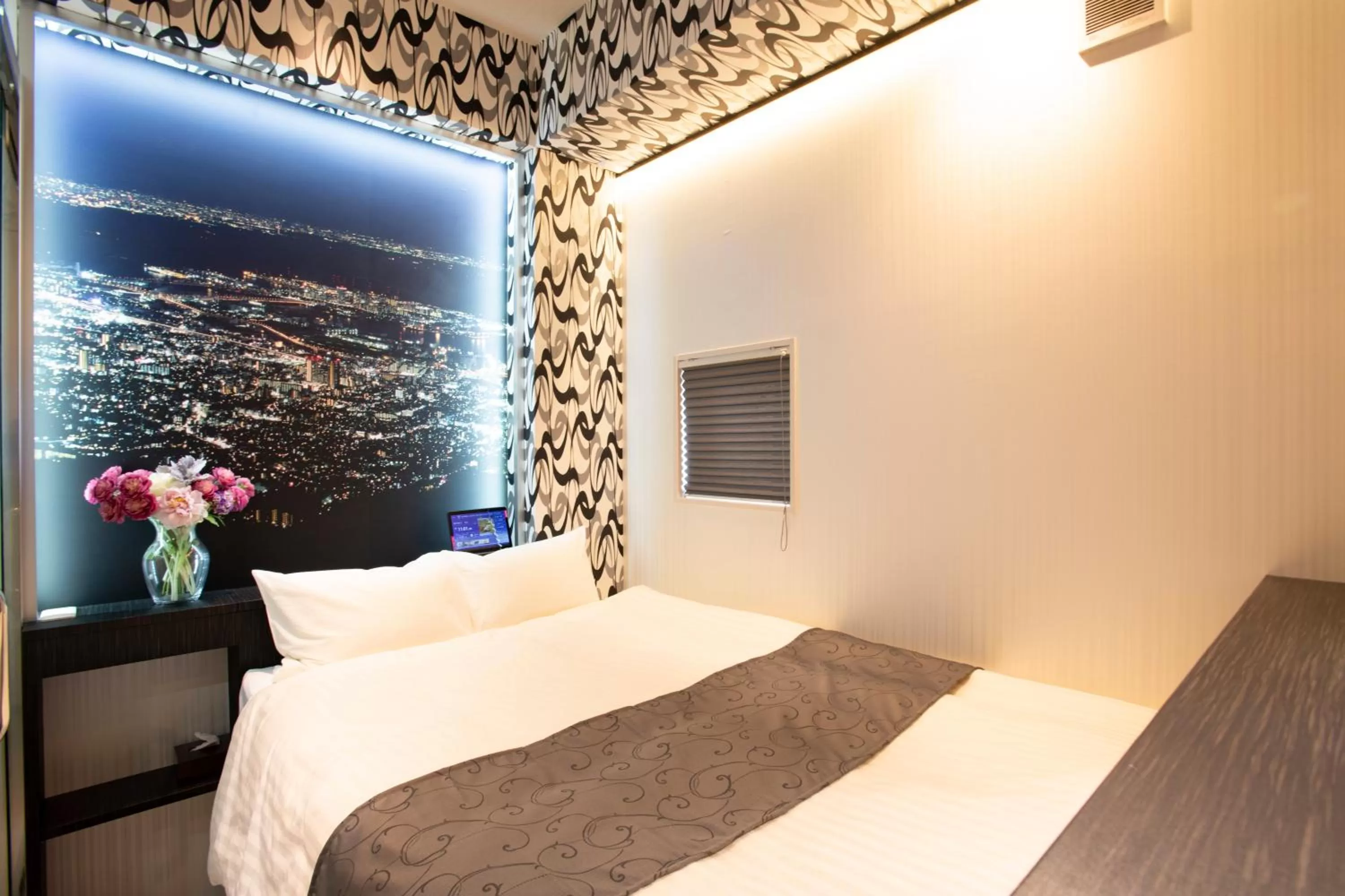 Bed in Pinpon Hotel Hiroshima