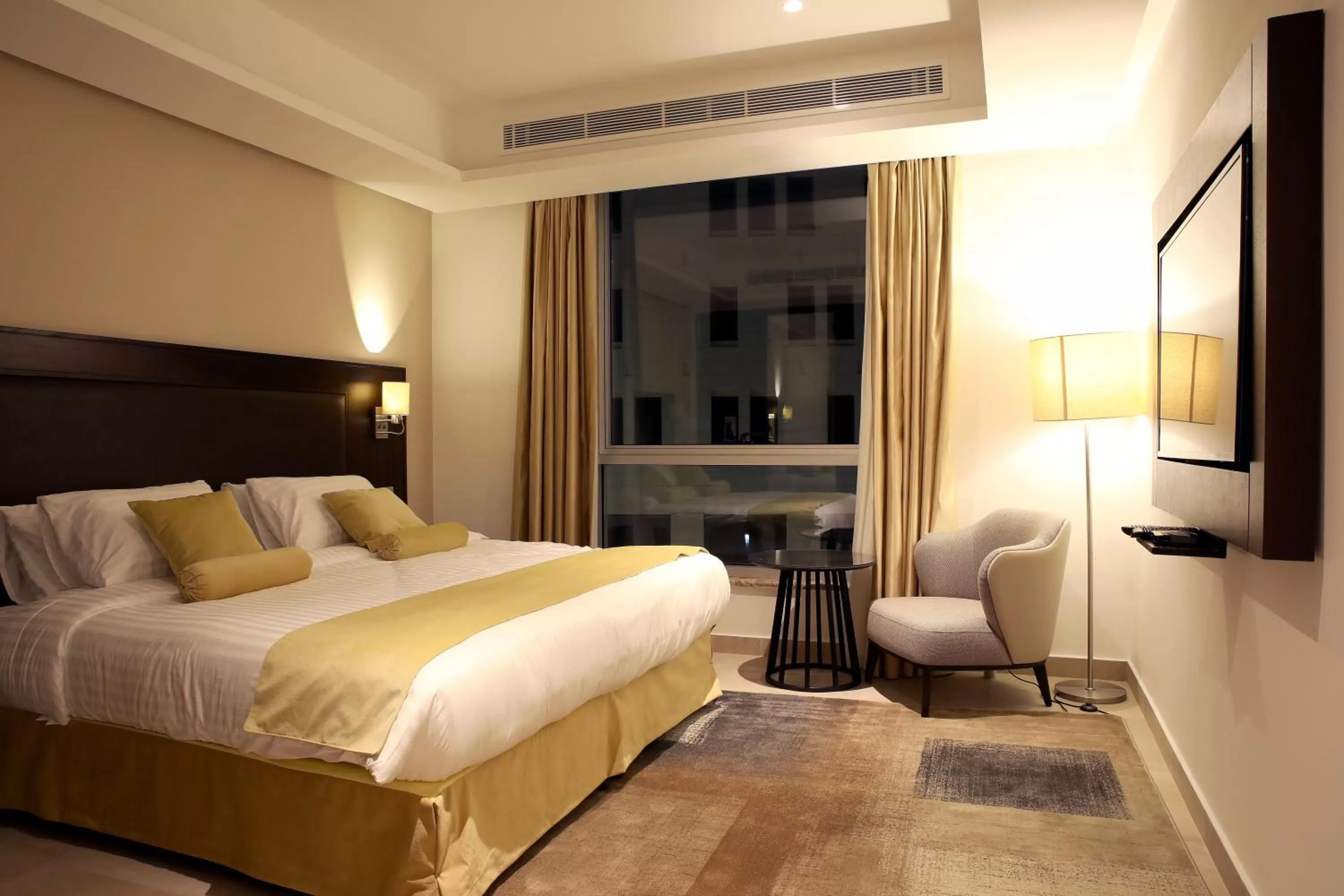 Bed in Downtown Hotel Apartments