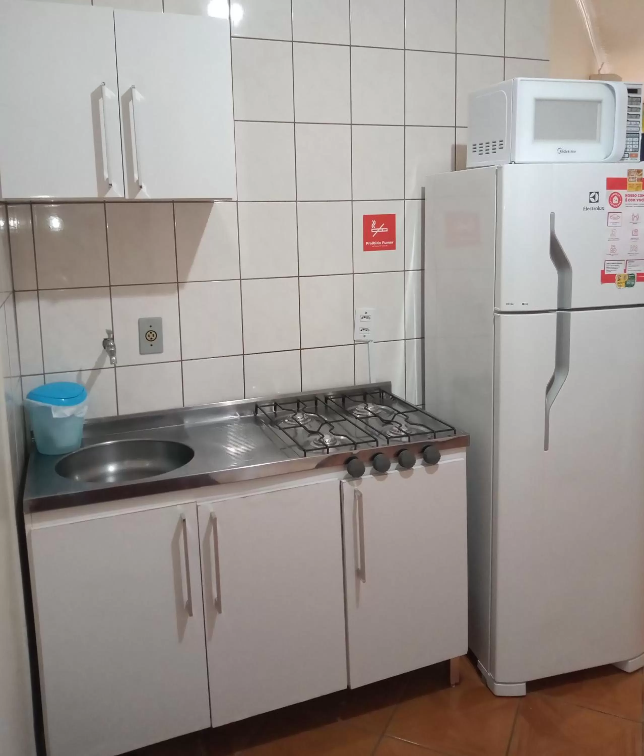 Kitchen or kitchenette in Pousada Japeju