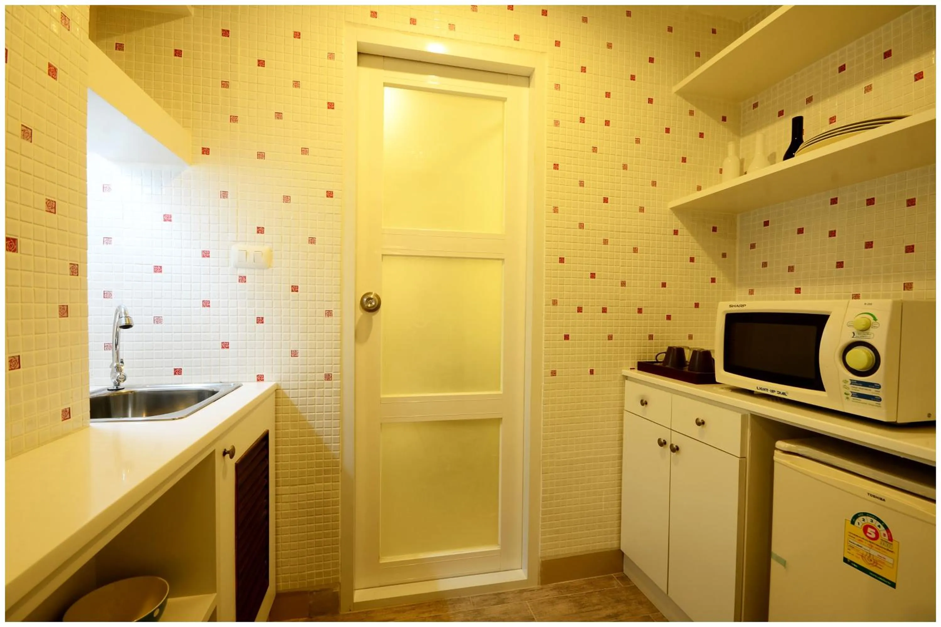 Kitchen or kitchenette in At Residence Suvarnabhumi Hotel