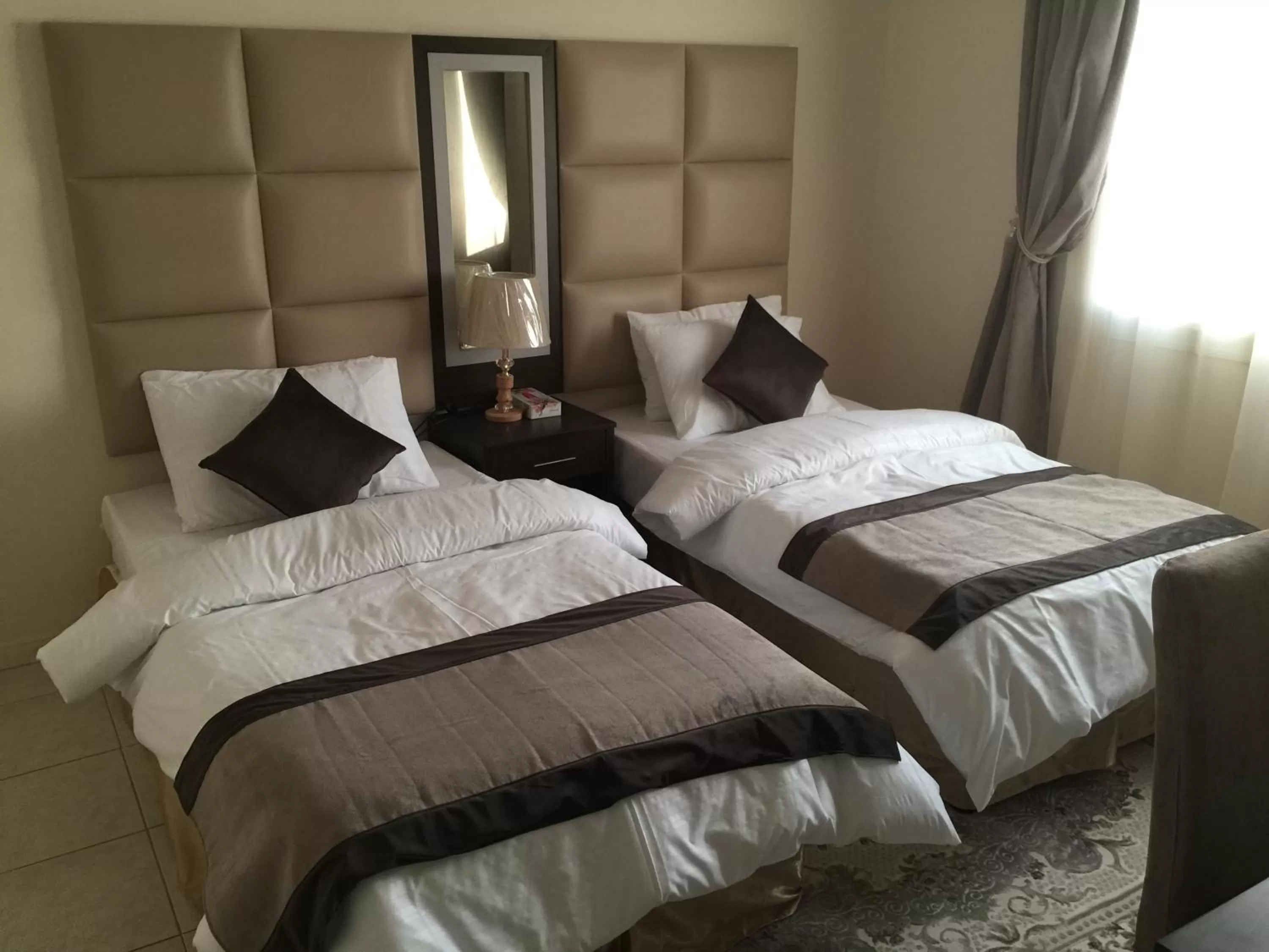Bed in Alshaheen Suites
